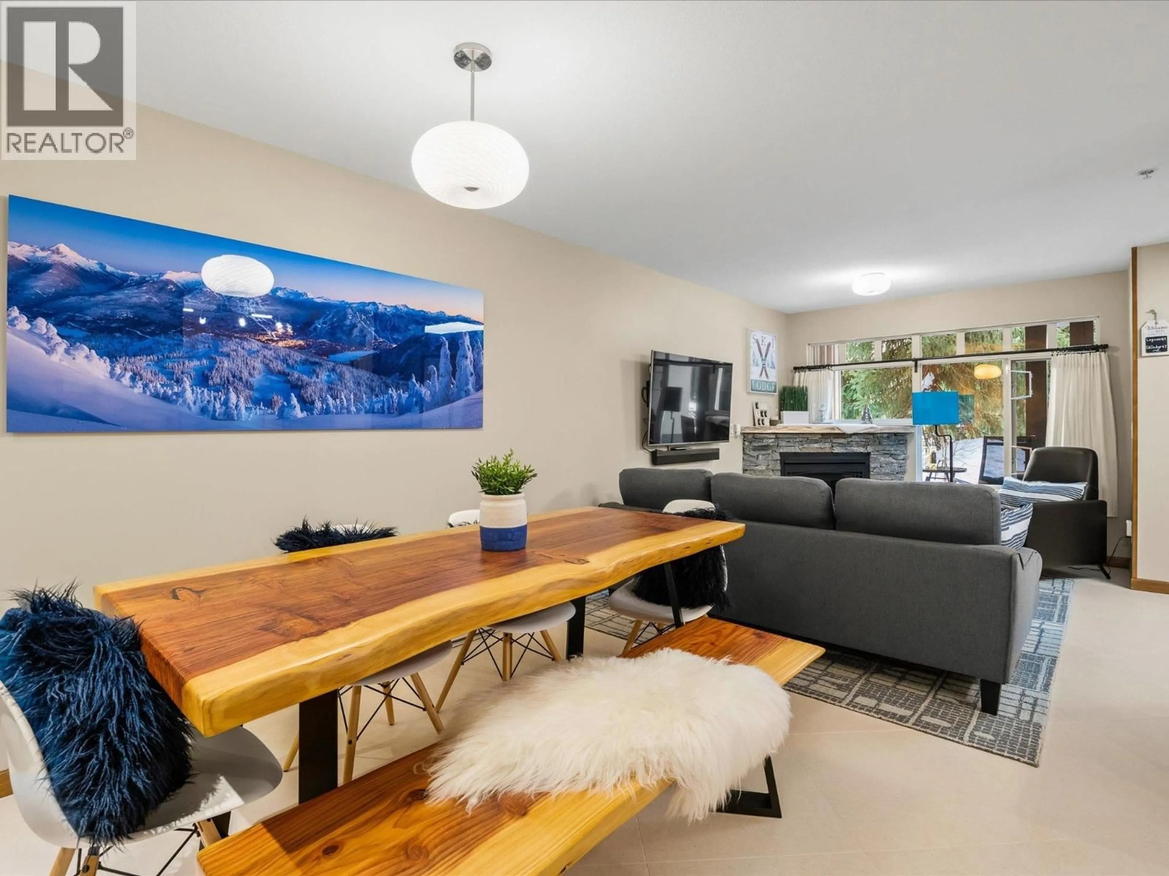 Living room with furniture, wood/laminate floor for 47 - 4335 NORTHLANDS BOULEVARD, Whistler British Columbia V0N1B4
