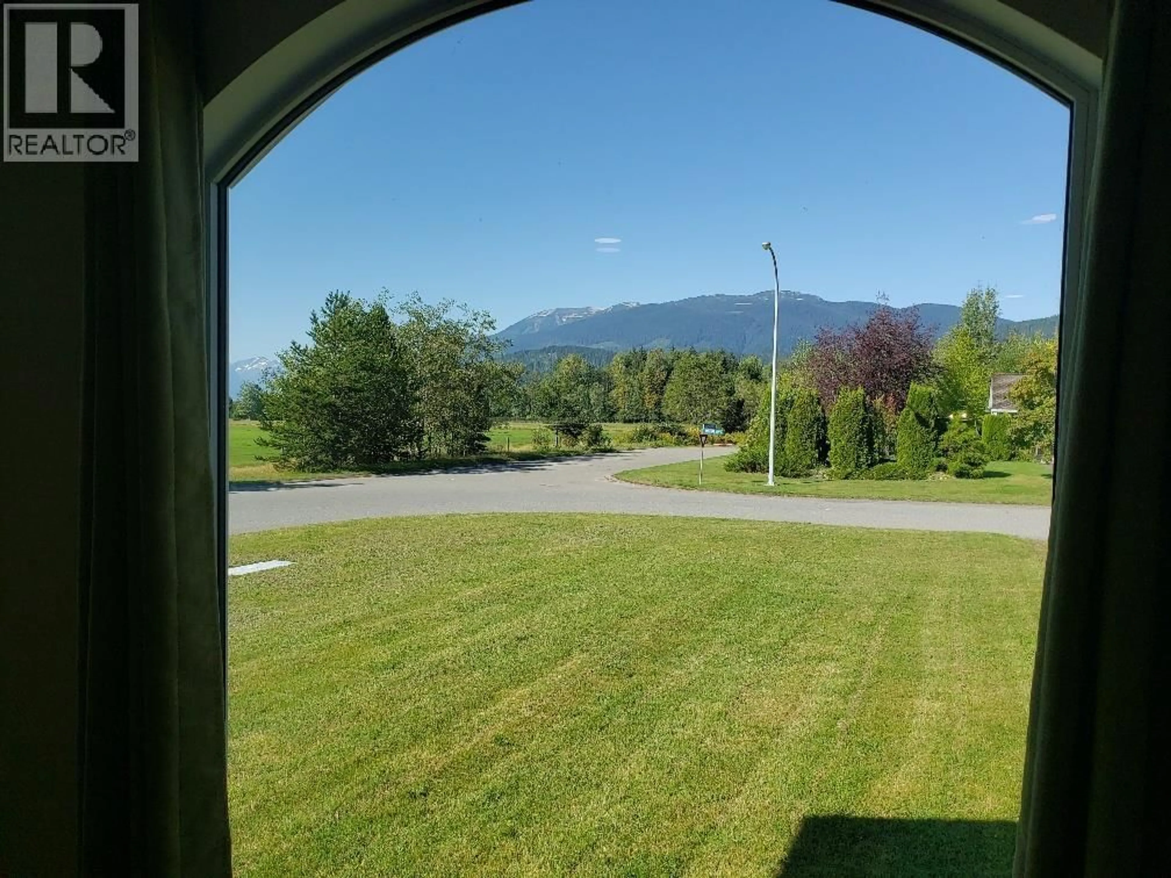 A pic from outside/outdoor area/front of a property/back of a property/a pic from drone, mountain view for 1 - 3602 STELLAR JAY DRIVE, Terrace British Columbia V8G0C5