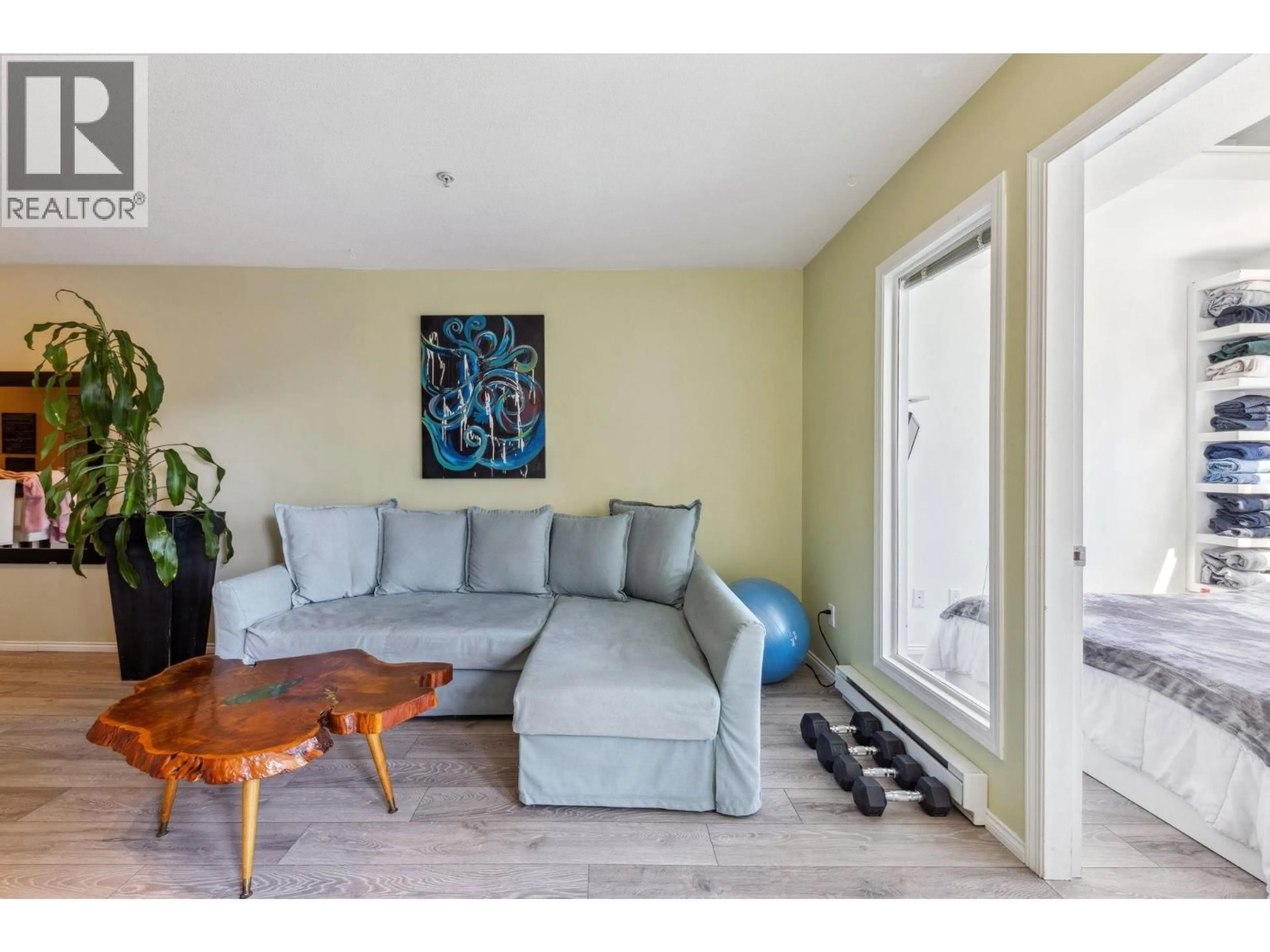Living room with furniture, unknown for 202 - 3939 HASTINGS STREET, Burnaby British Columbia V5C2H8