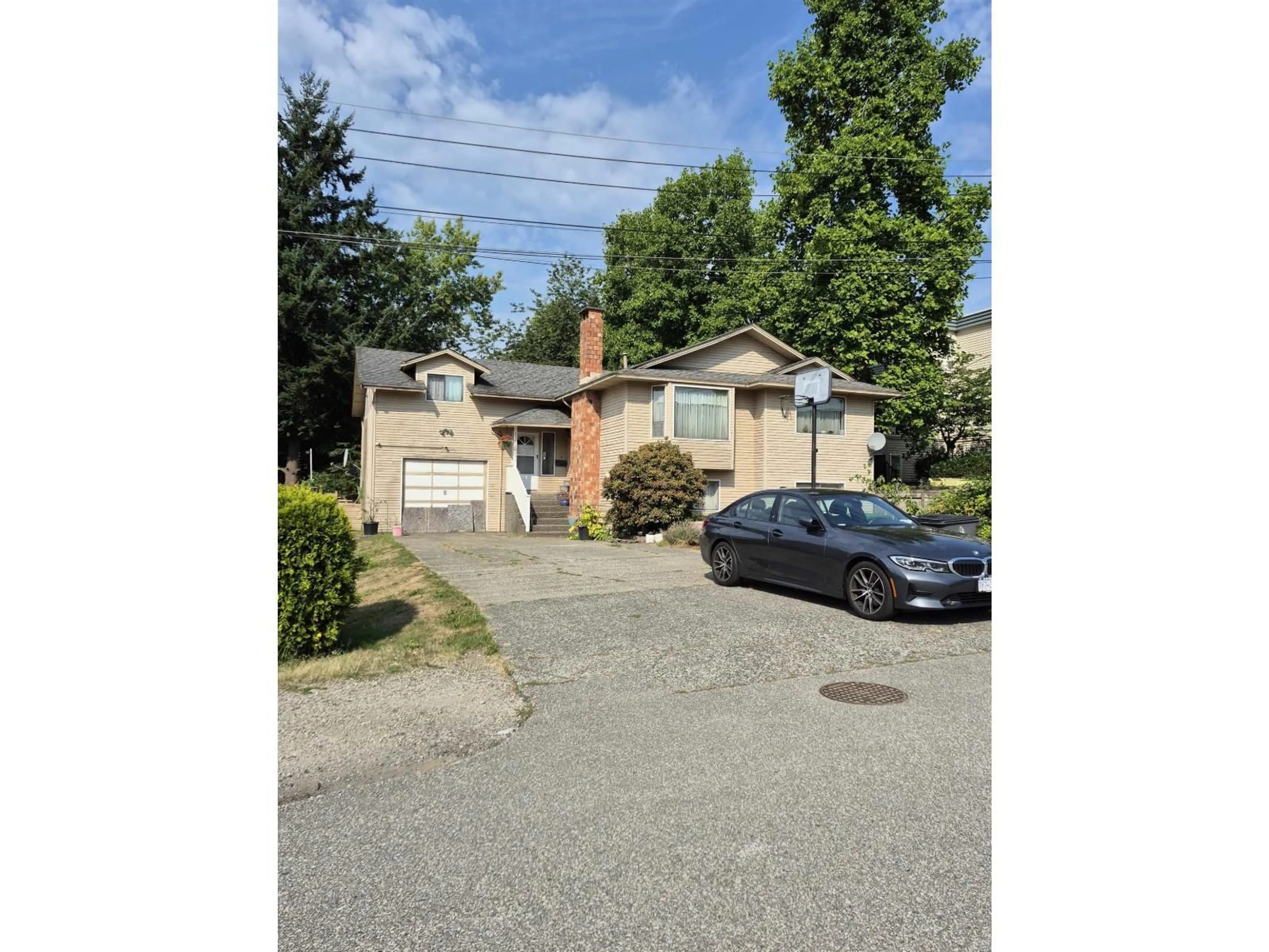 A pic from outside/outdoor area/front of a property/back of a property/a pic from drone, street for 10661 138A, Surrey British Columbia V3T4L2