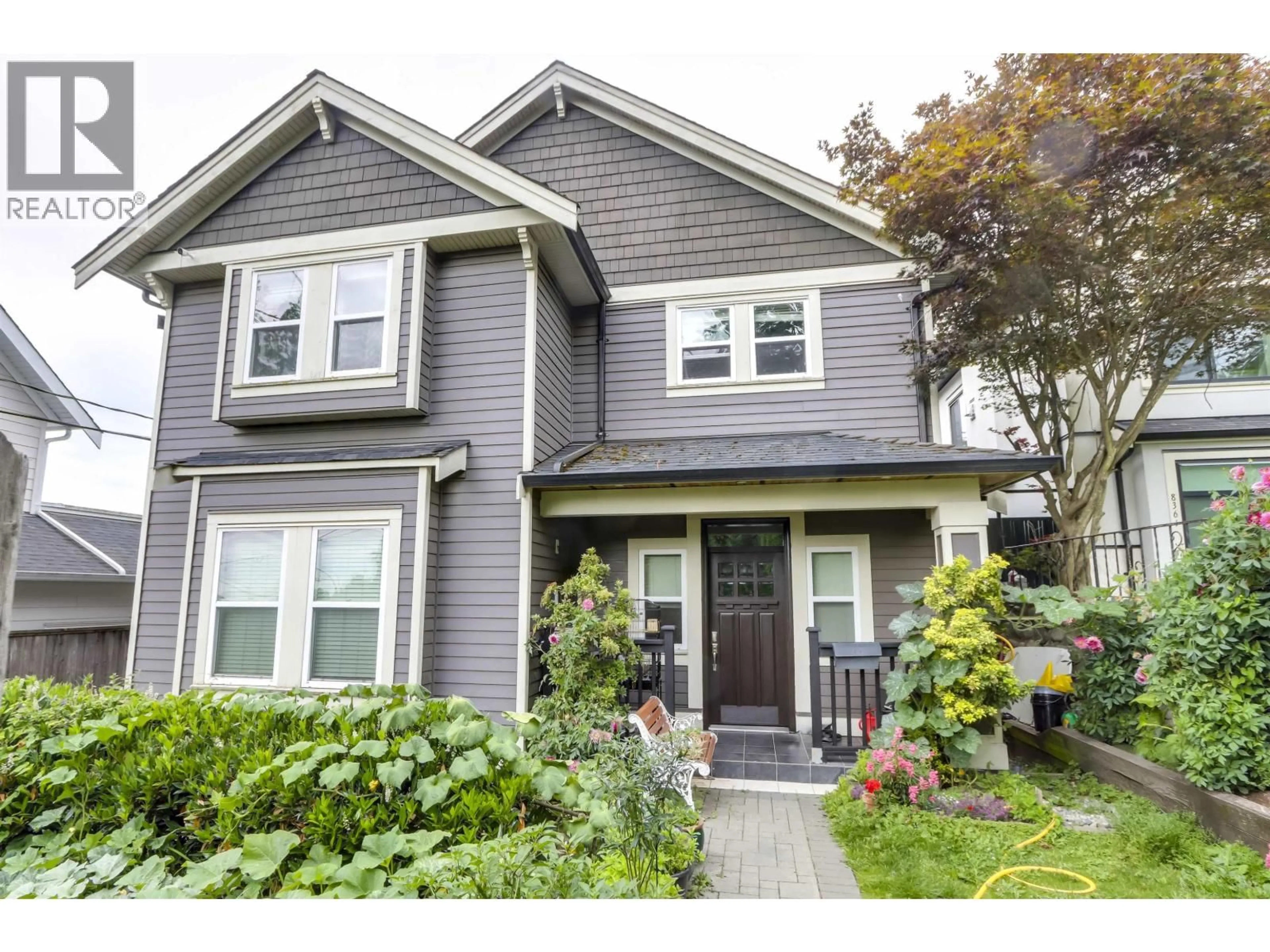 Home with vinyl exterior material, street for 8363 VICTORIA DRIVE, Vancouver British Columbia V5P4A8