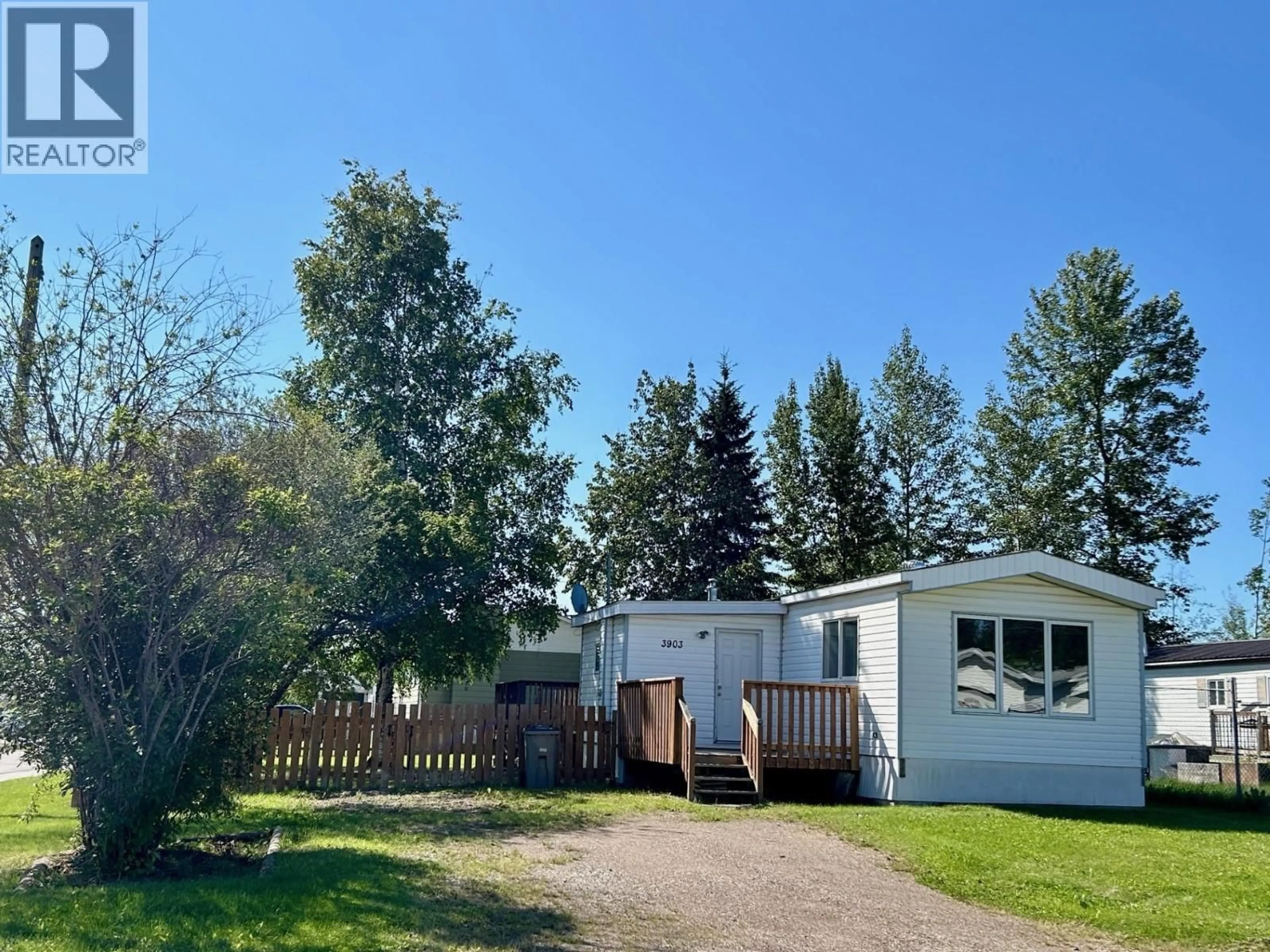 A pic from outside/outdoor area/front of a property/back of a property/a pic from drone, unknown for 3903 POPLAR AVENUE, Fort Nelson British Columbia V0C1R0