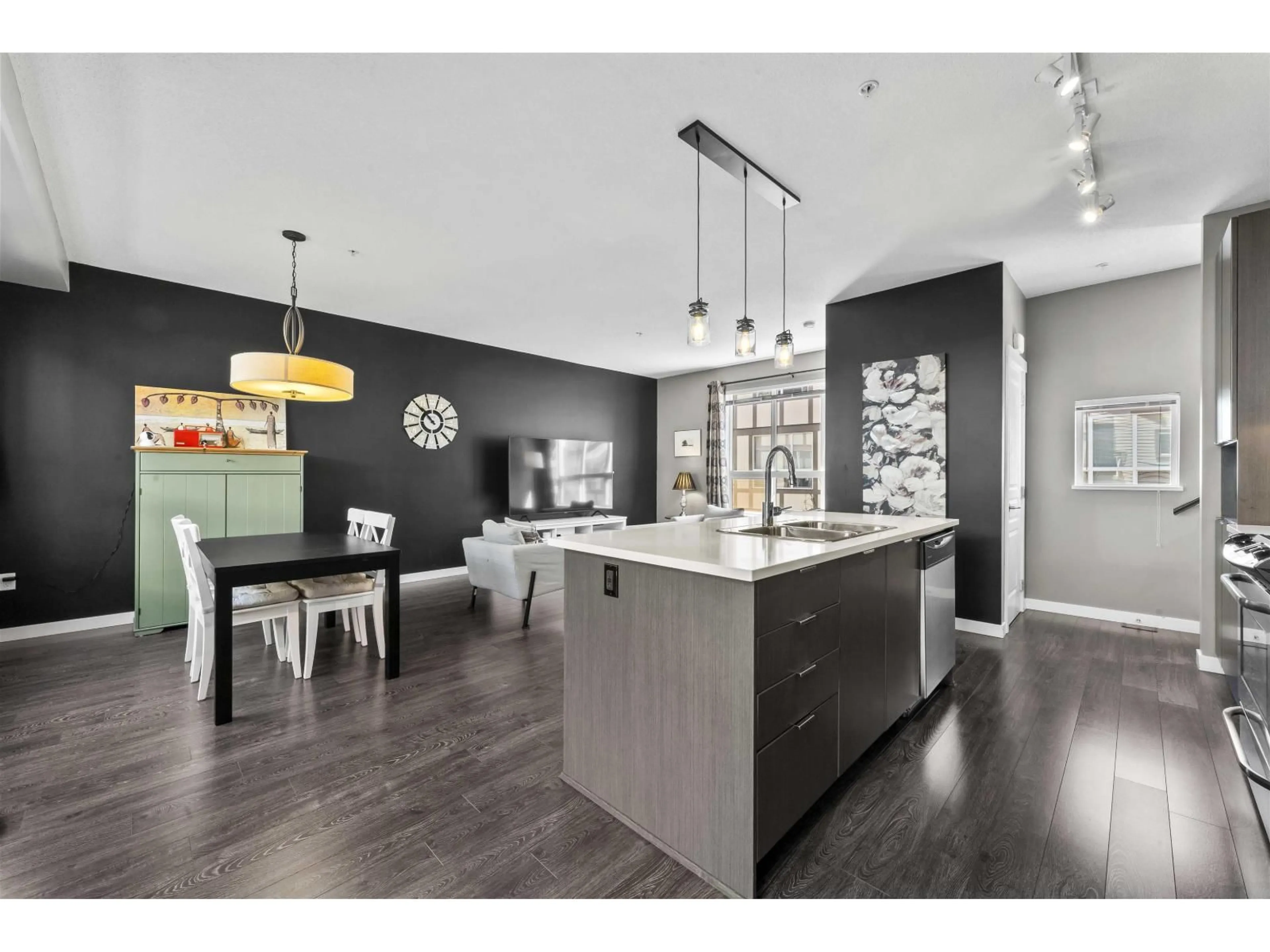 Open concept kitchen, wood/laminate floor for 13 - 7848 209, Langley British Columbia V2Y0M4