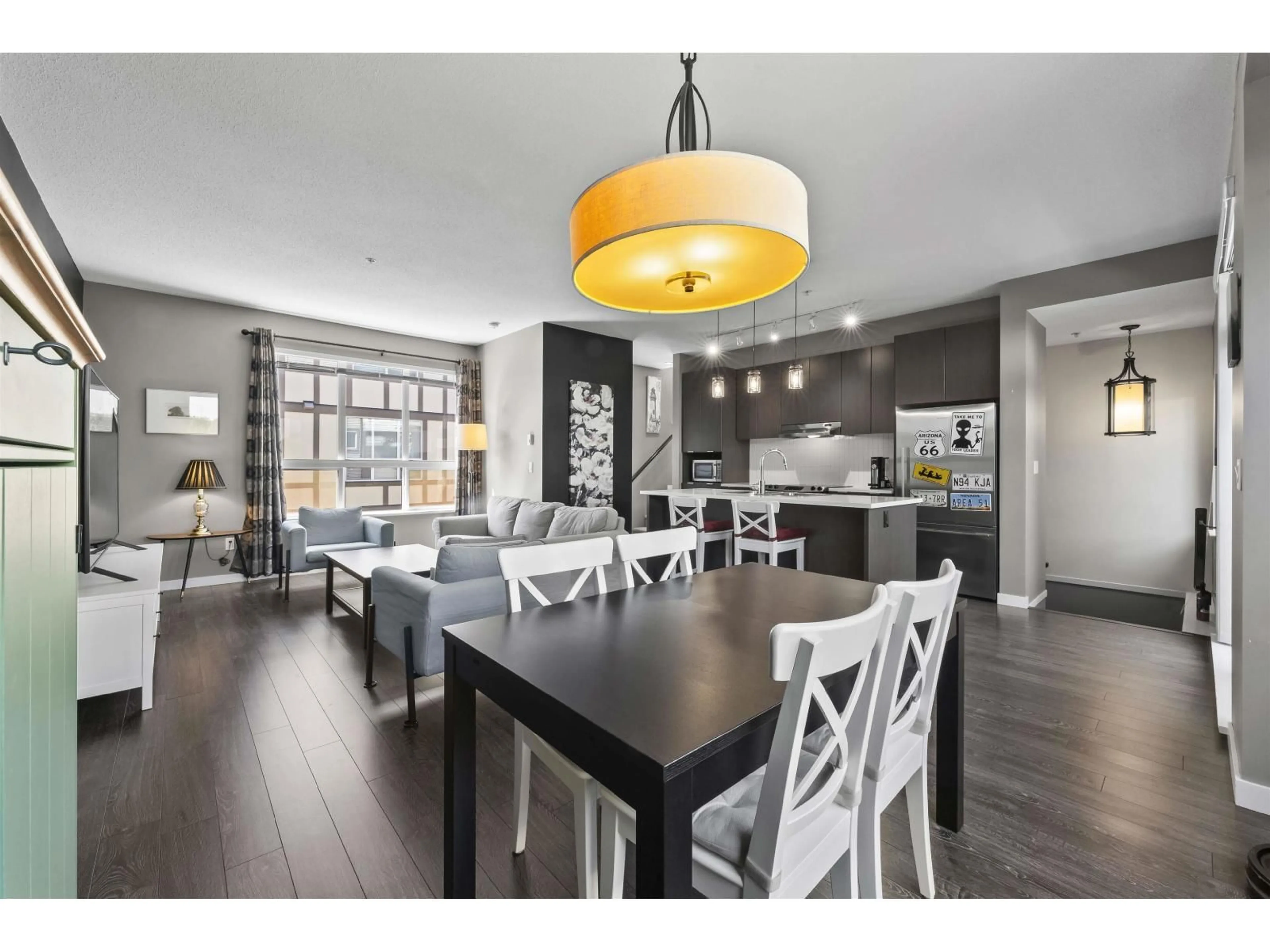 Open concept kitchen, wood/laminate floor for 13 - 7848 209, Langley British Columbia V2Y0M4