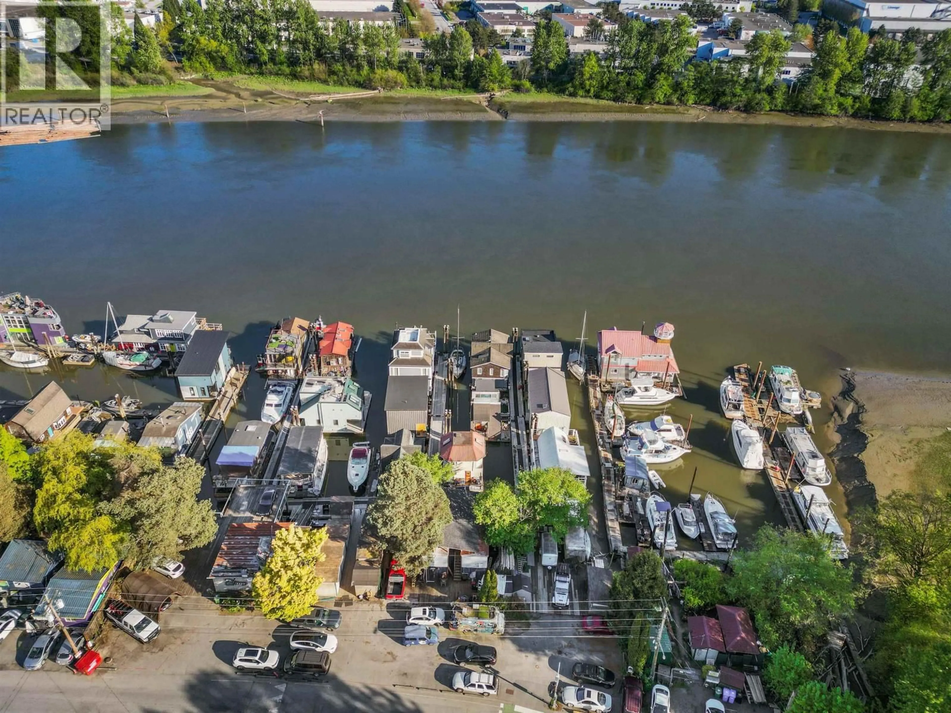 A pic from outside/outdoor area/front of a property/back of a property/a pic from drone, water/lake/river/ocean view for 7 - 23000 DYKE ROAD, Richmond British Columbia V6V2H3