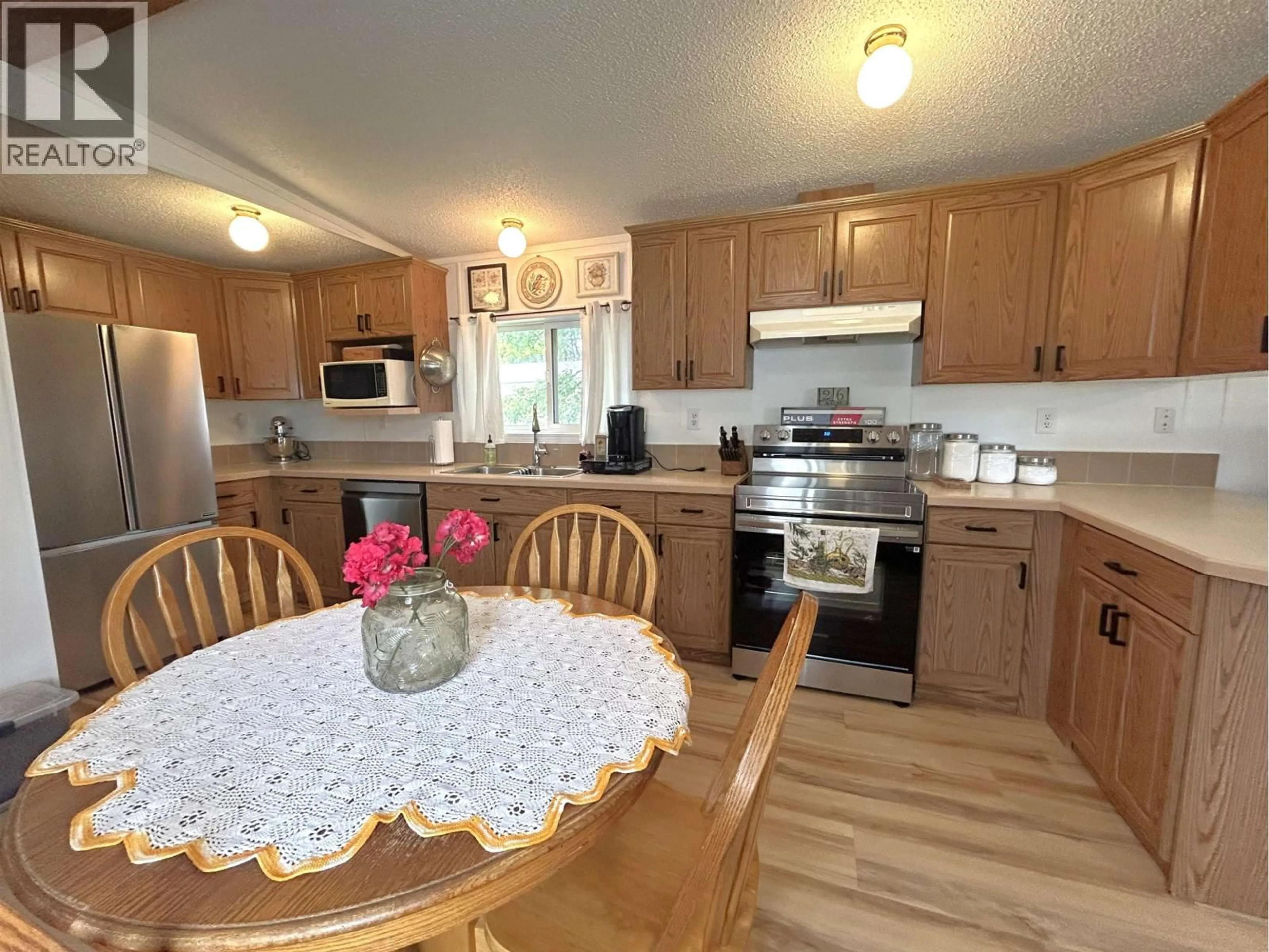 Standard kitchen, wood/laminate floor for C52 - 7817 97 HIGHWAY, Prince George British Columbia V2N6P6