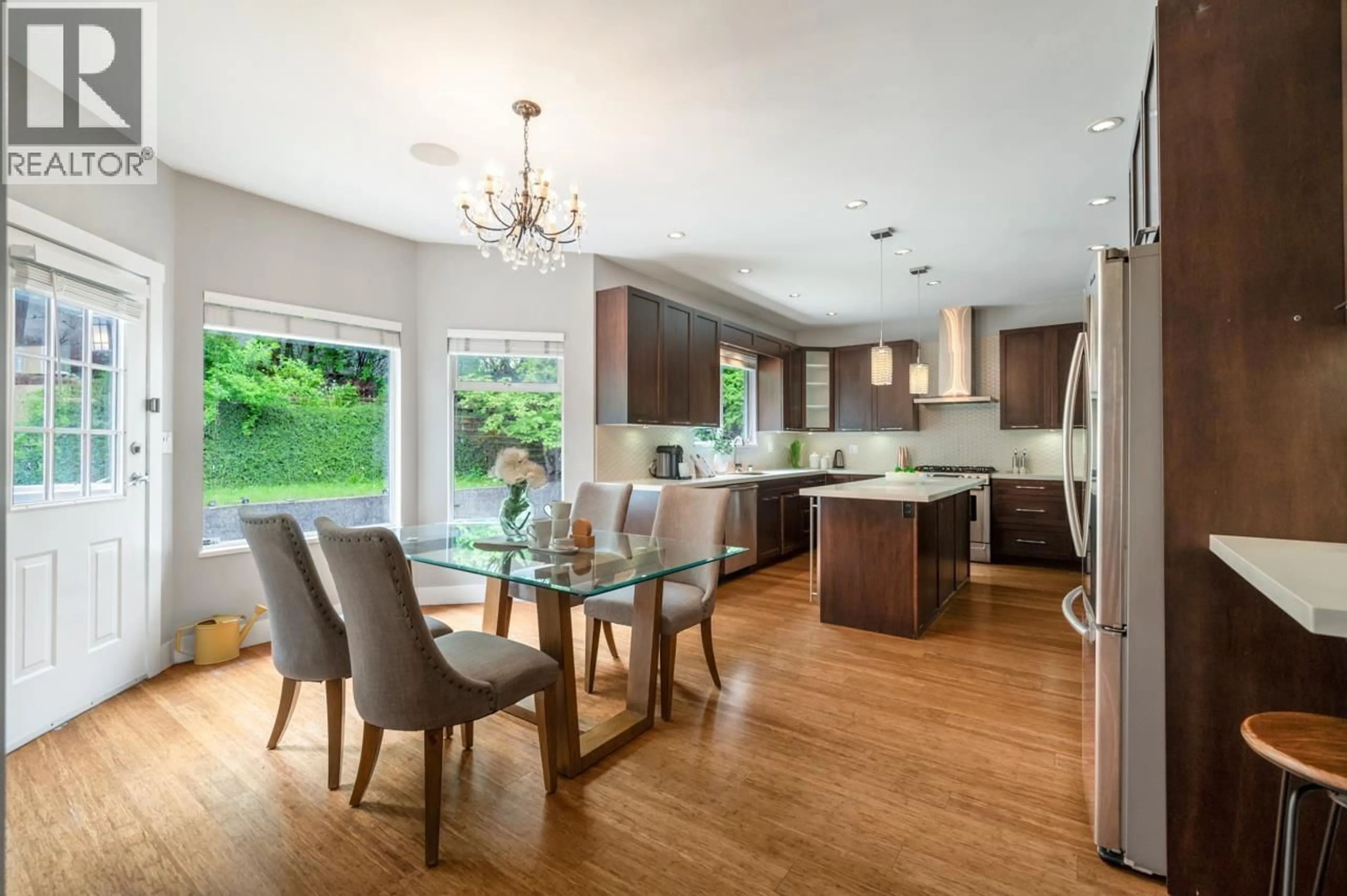Open concept kitchen, wood/laminate floor for 9116 BRIAR ROAD, Burnaby British Columbia V3N4W8