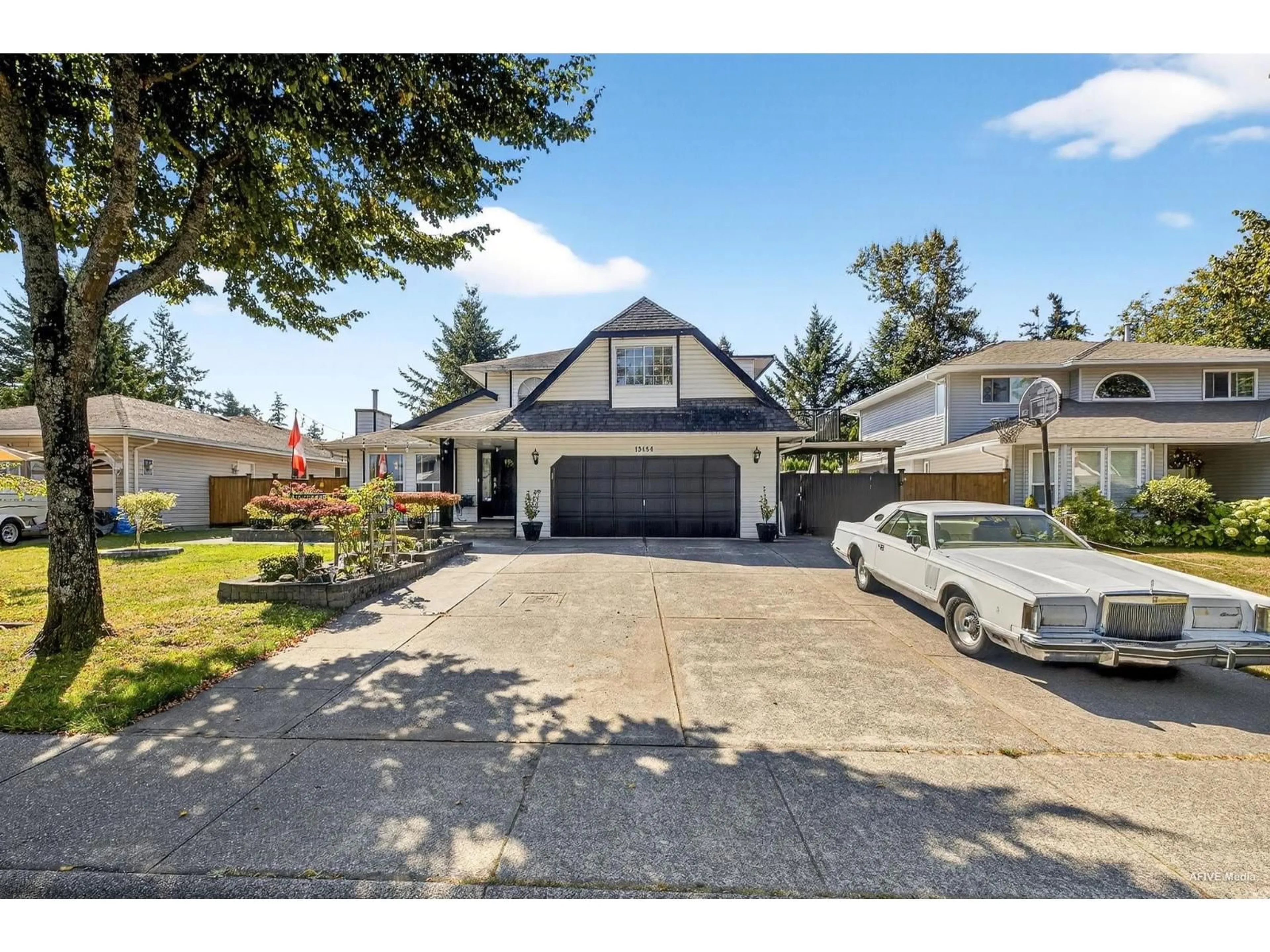 Home with vinyl exterior material, street for 13454 59B, Surrey British Columbia V3X1L1