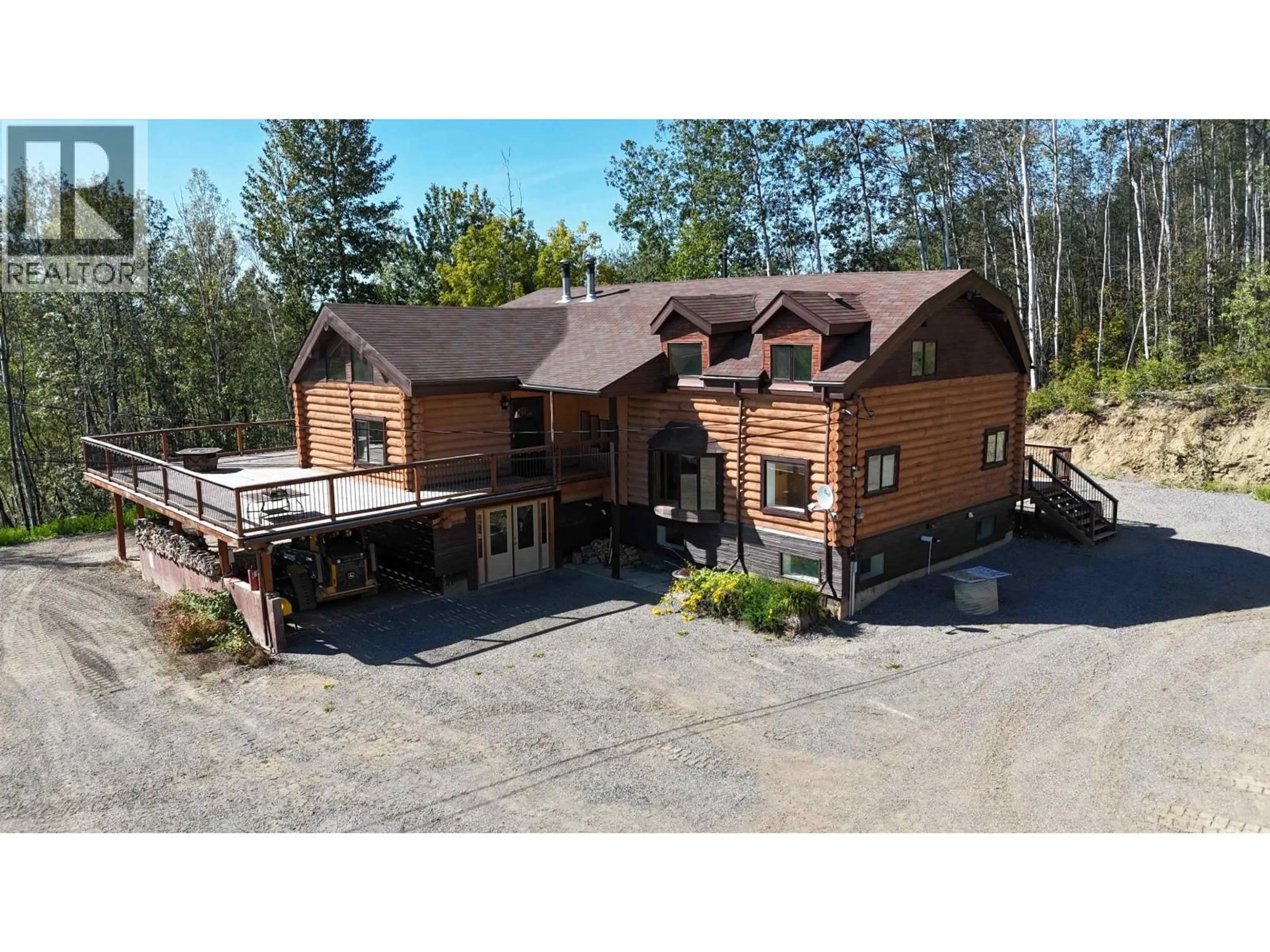 A pic from outside/outdoor area/front of a property/back of a property/a pic from drone, mountain view for 7540 VALLEYVIEW DRIVE, Fort Nelson British Columbia V0C1R0