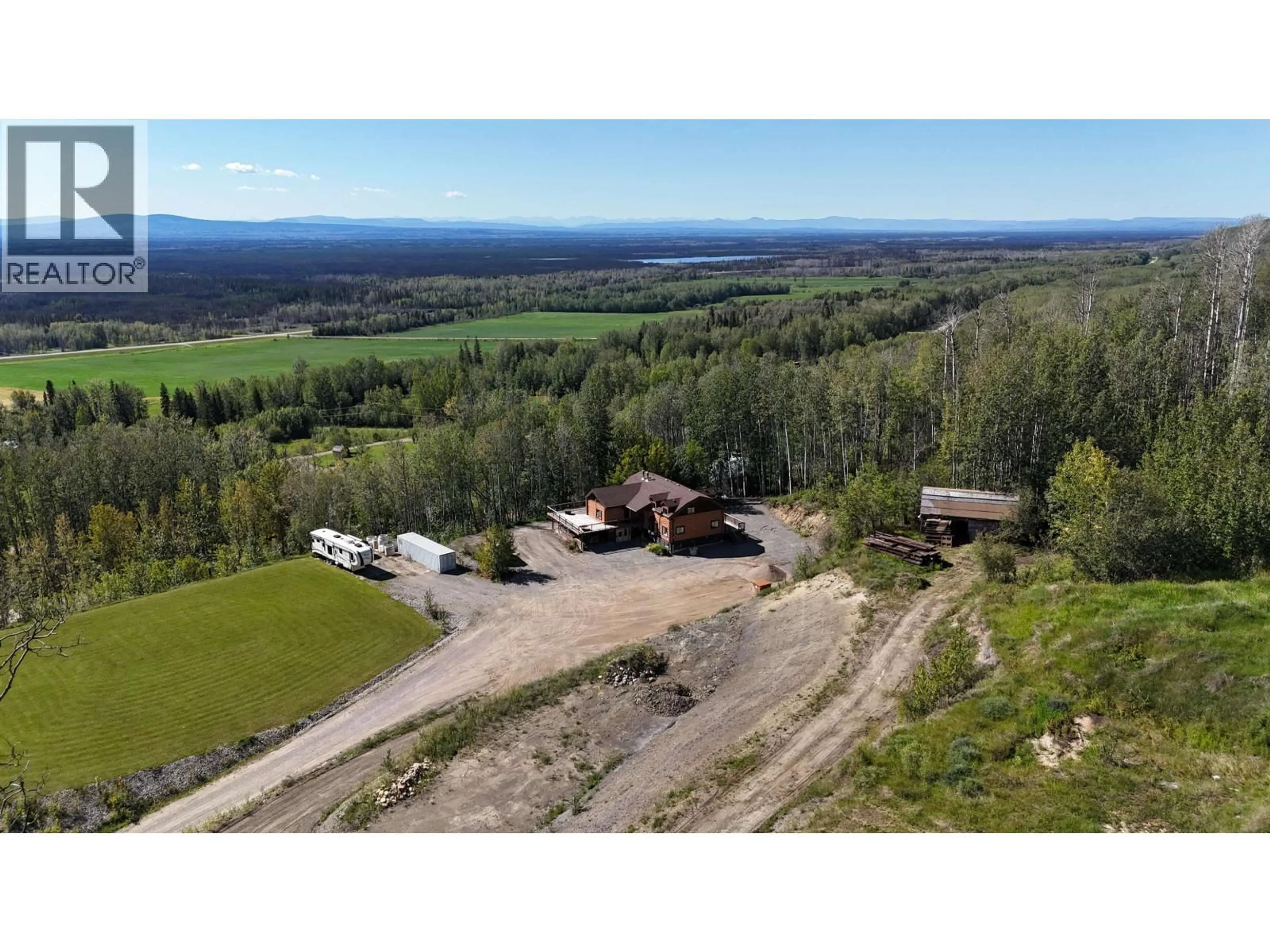 A pic from outside/outdoor area/front of a property/back of a property/a pic from drone, unknown for 7540 VALLEYVIEW DRIVE, Fort Nelson British Columbia V0C1R0
