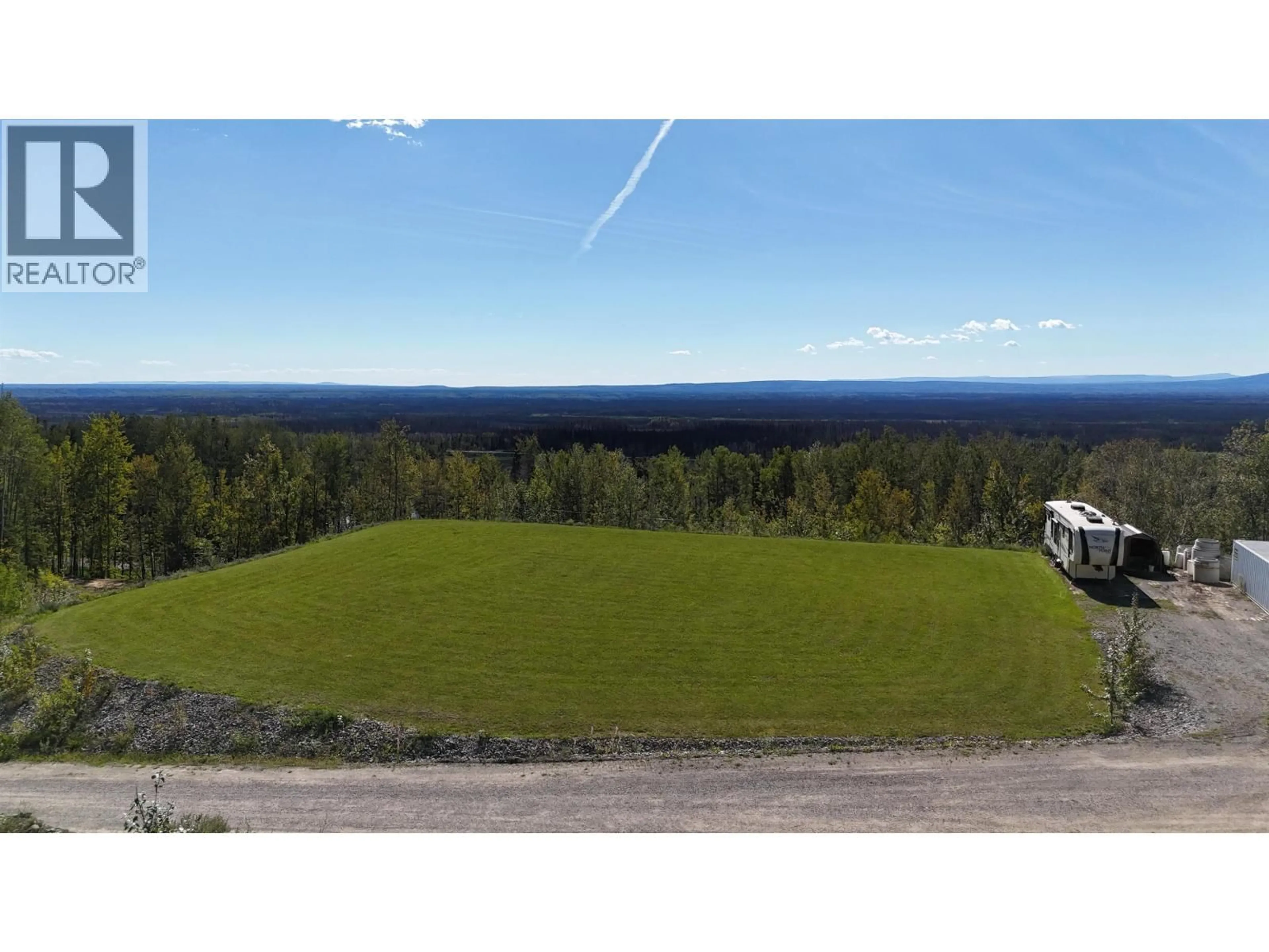 A pic from outside/outdoor area/front of a property/back of a property/a pic from drone, forest/trees view for 7540 VALLEYVIEW DRIVE, Fort Nelson British Columbia V0C1R0