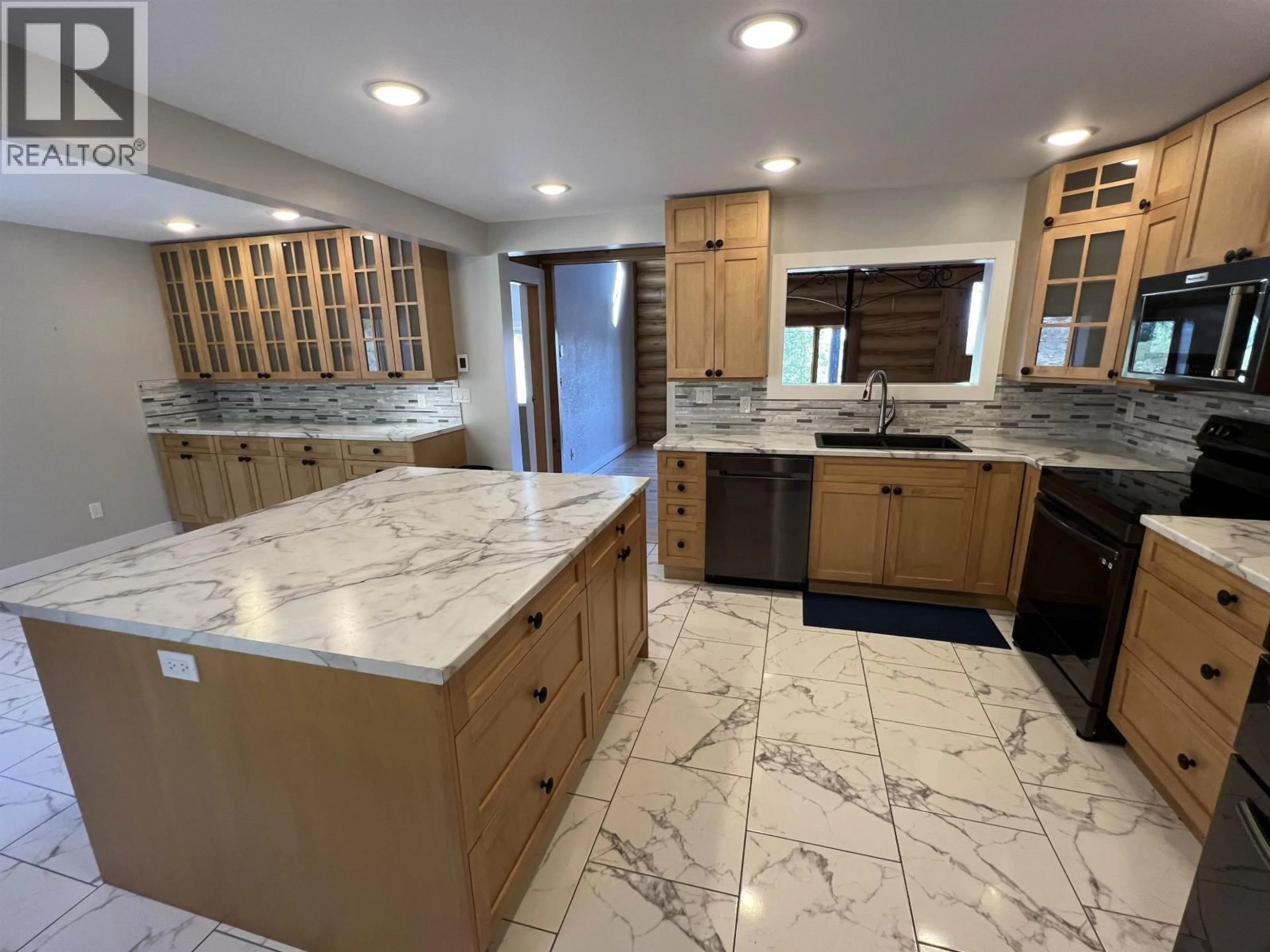 Open concept kitchen, ceramic/tile floor for 7540 VALLEYVIEW DRIVE, Fort Nelson British Columbia V0C1R0