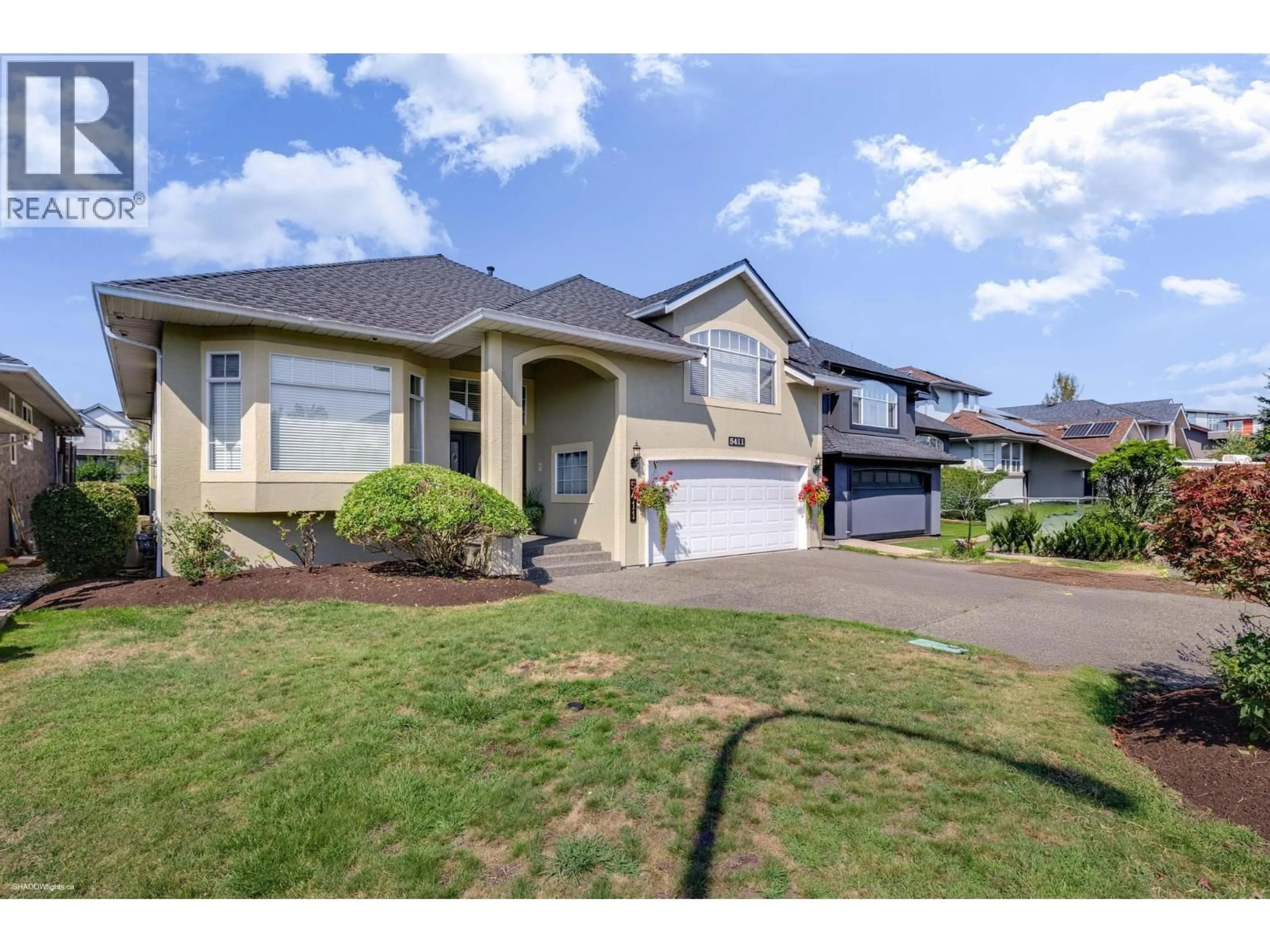 Home with vinyl exterior material, street for 5411 MCCOLL CRESCENT, Richmond British Columbia V6V2L6