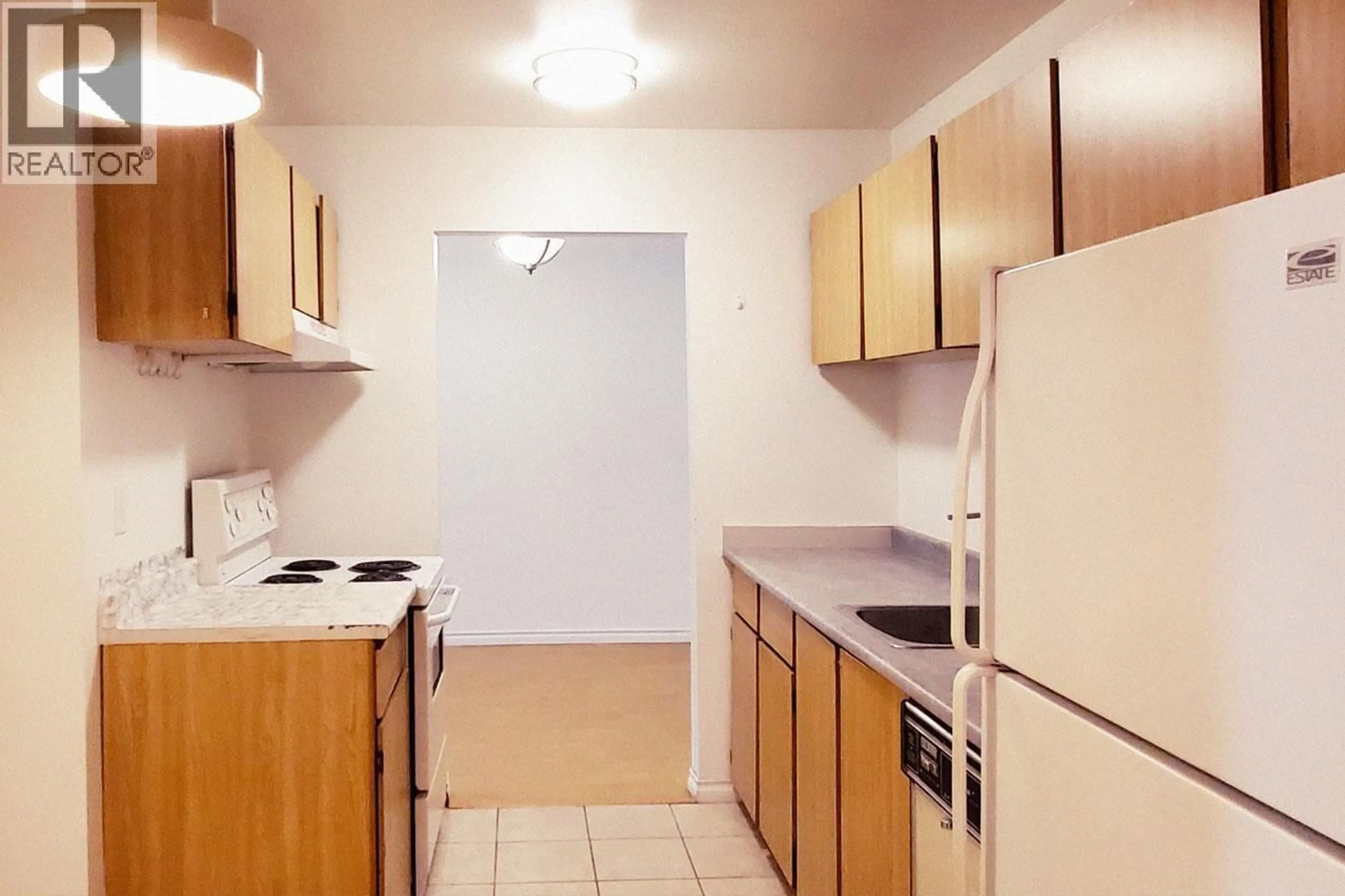 Standard kitchen, unknown for 103 - 8400 ACKROYD ROAD, Richmond British Columbia V6X3E8