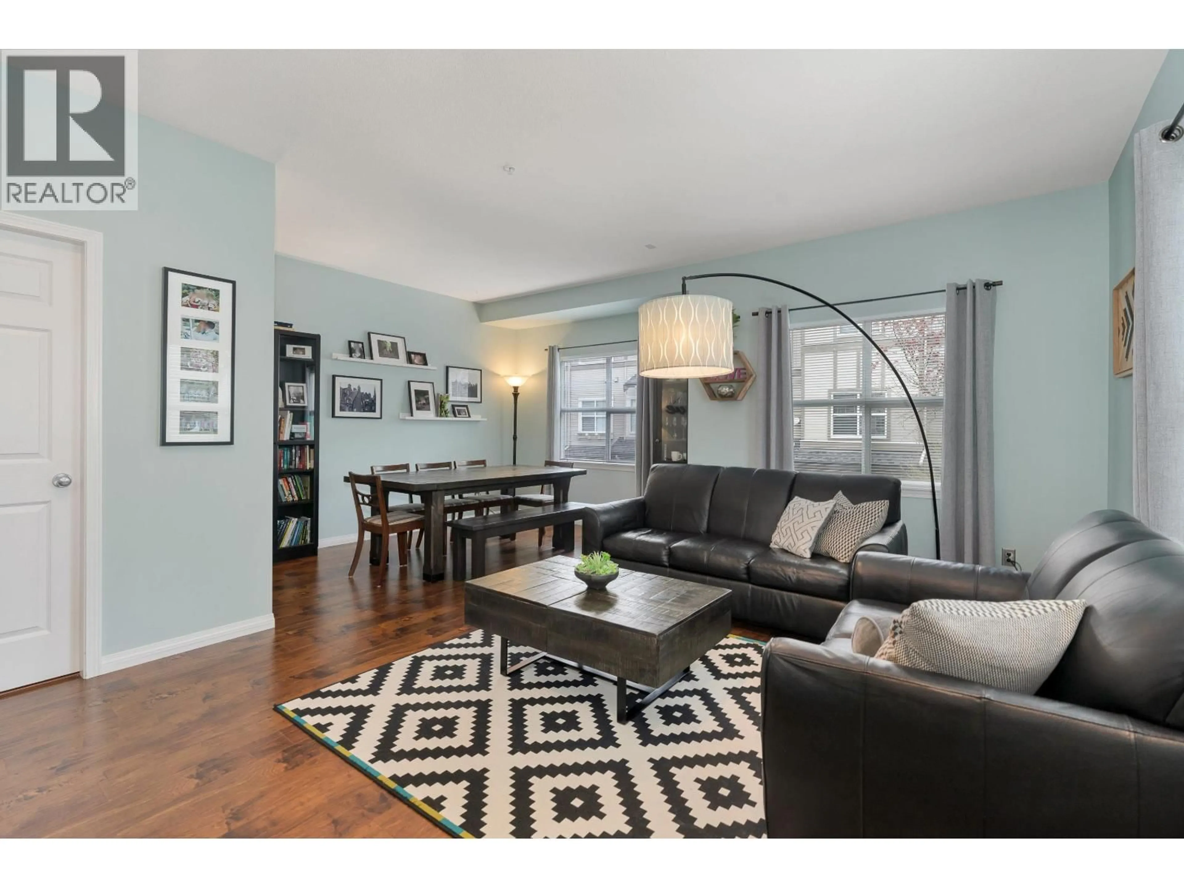 Living room with furniture, wood/laminate floor for 12 - 1055 RIVERWOOD GATE, Port Coquitlam British Columbia V3B8C3