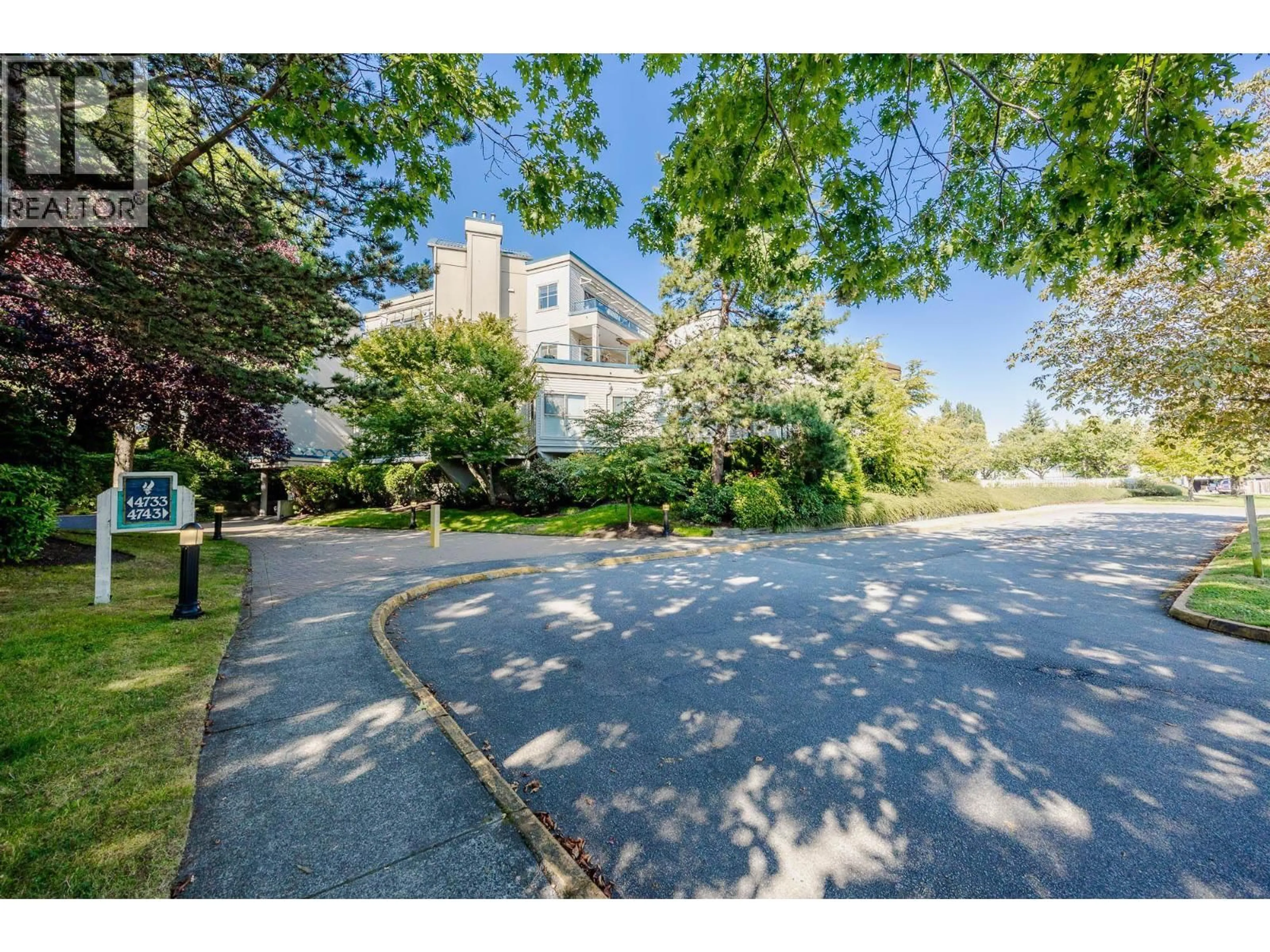 A pic from outside/outdoor area/front of a property/back of a property/a pic from drone, street for 112 - 4743 W RIVER ROAD, Ladner British Columbia V4K1R9