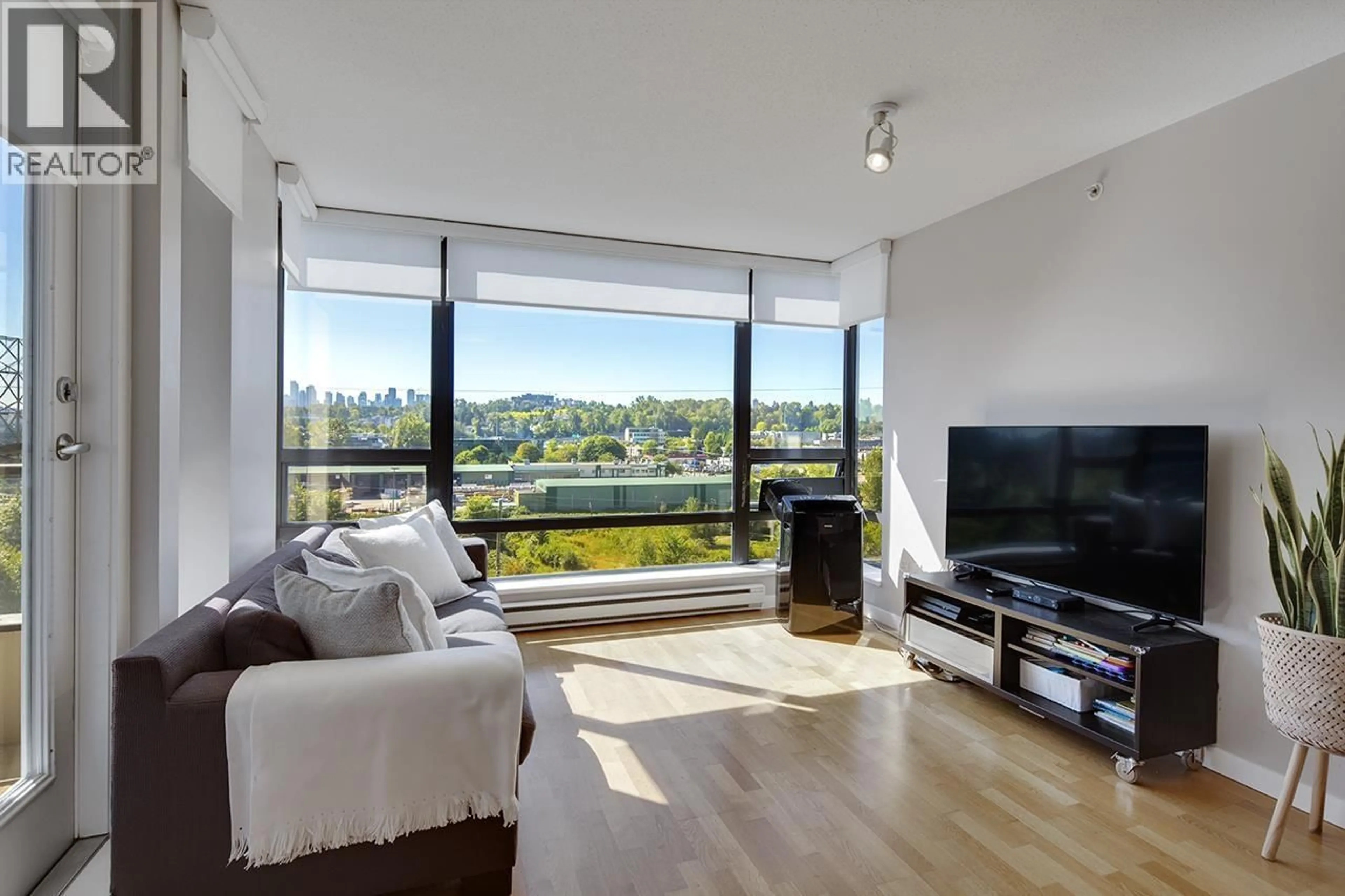 Living room with furniture, wood/laminate floor for 806 - 4178 DAWSON STREET, Burnaby British Columbia V5C0A1