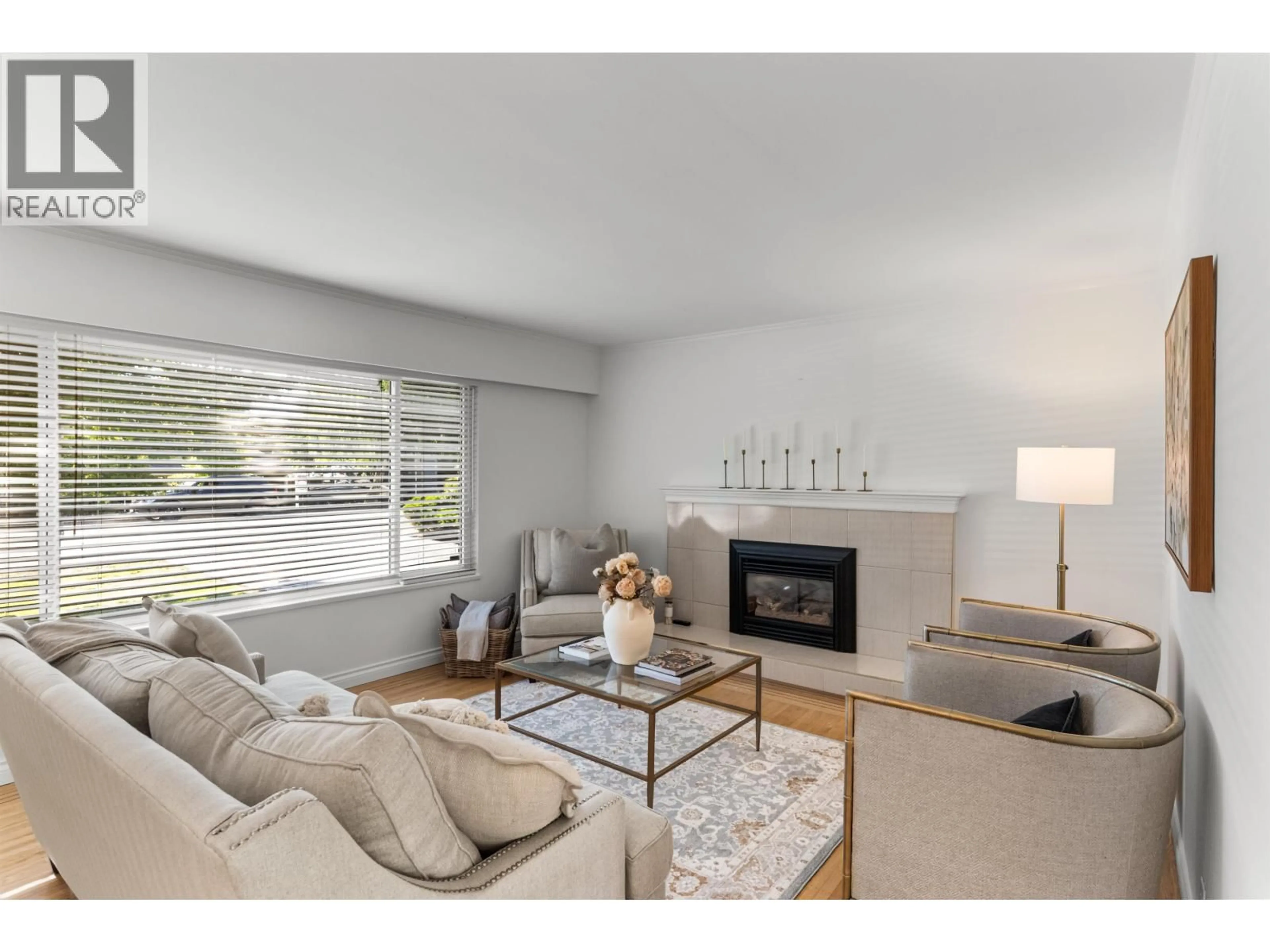Living room with furniture, wood/laminate floor for 861 53A STREET, Delta British Columbia V4M3C8