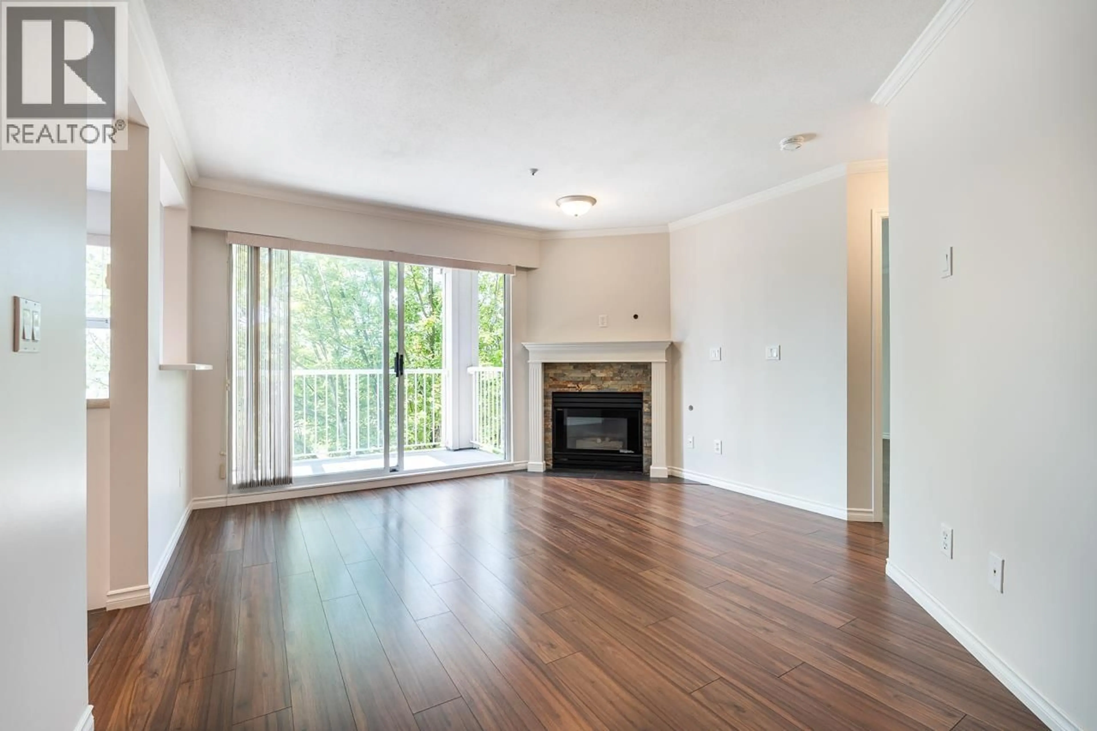 Living room with furniture, wood/laminate floor for 302 - 135 ELEVENTH STREET, New Westminster British Columbia V3M4C7