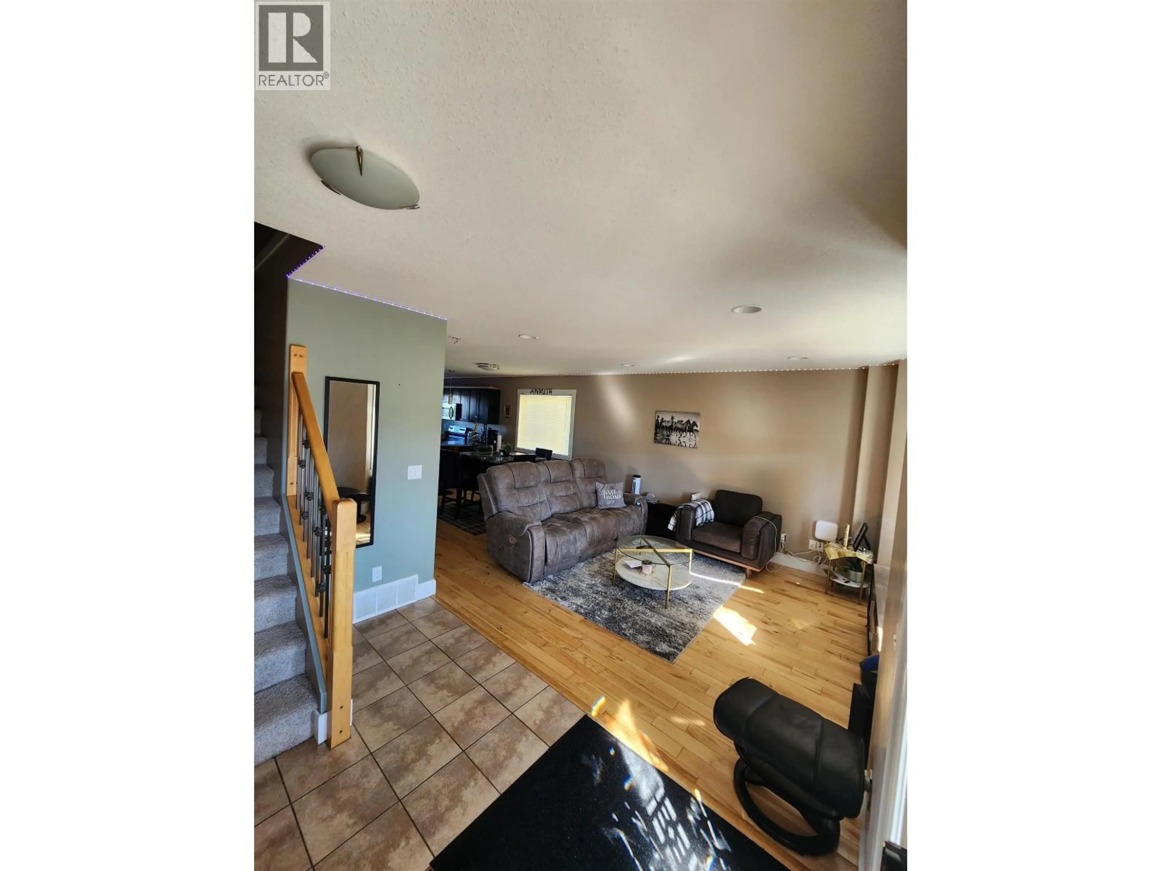 Living room with furniture, unknown for 8314 87 STREET, Fort St. John British Columbia V1J3M7