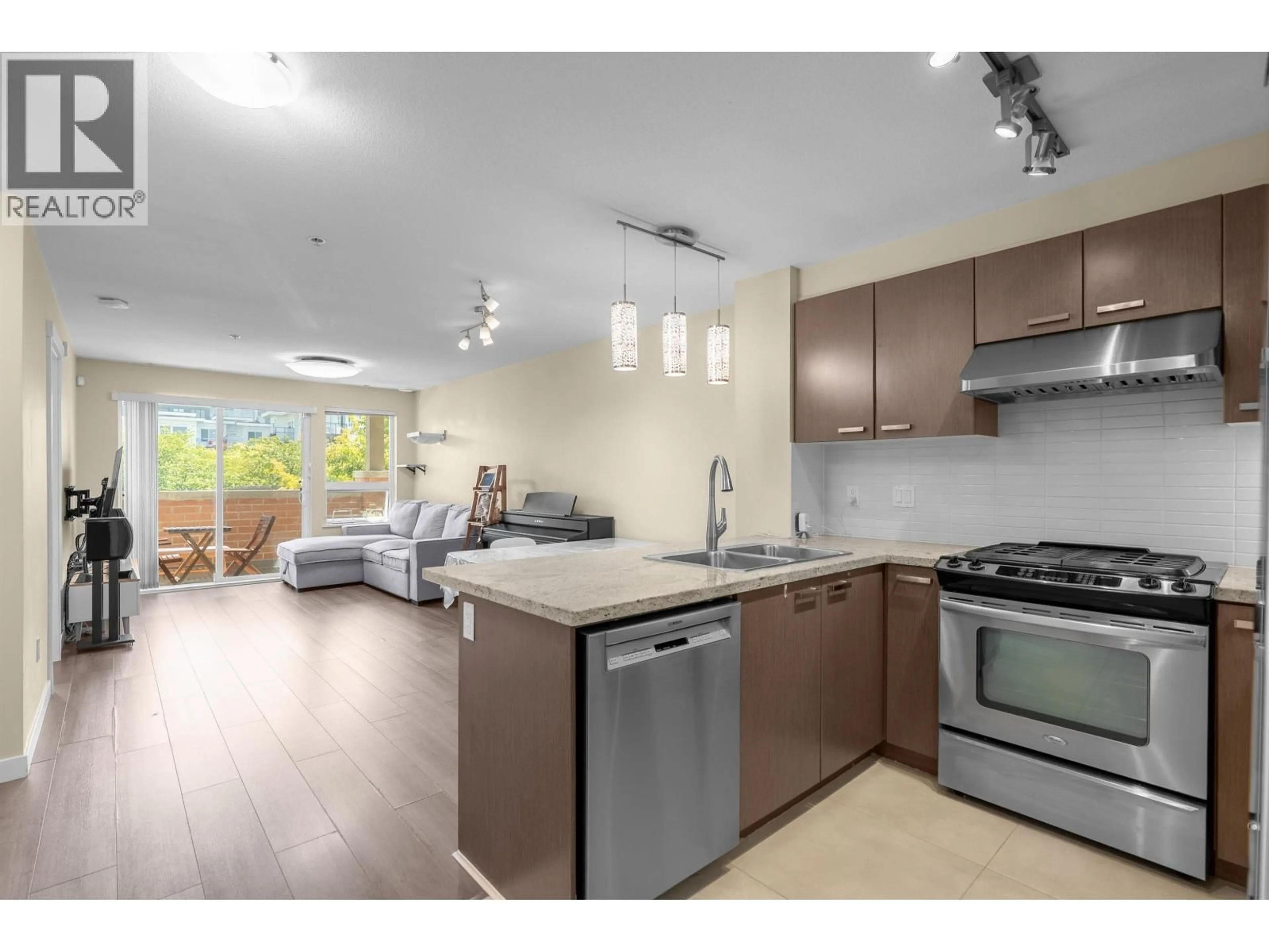 Open concept kitchen, unknown for 219 - 9500 ODLIN ROAD, Richmond British Columbia V6X0H5