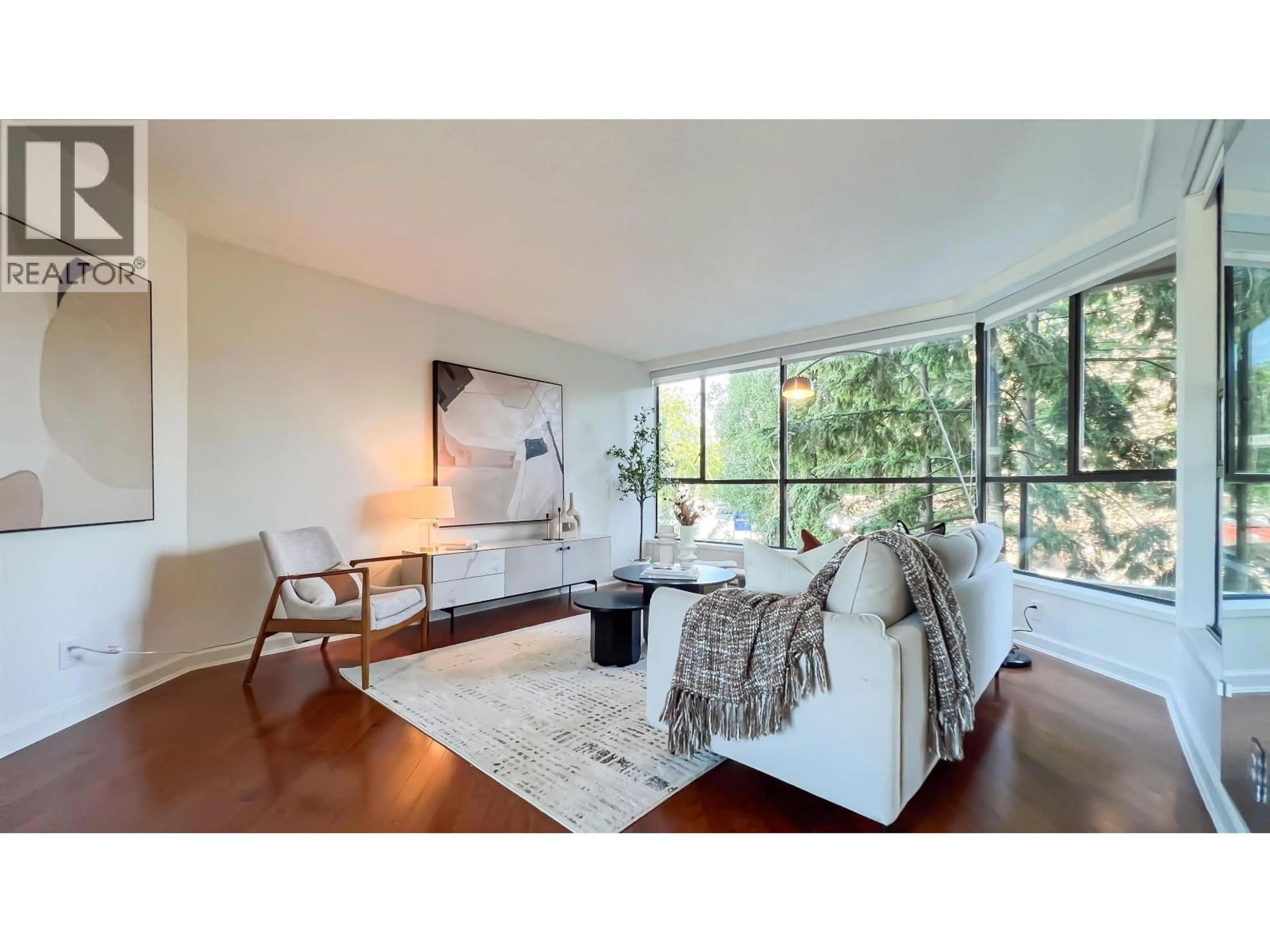 Living room with furniture, unknown for 101 - 1450 PENNYFARTHING DRIVE, Vancouver British Columbia V6J4X8