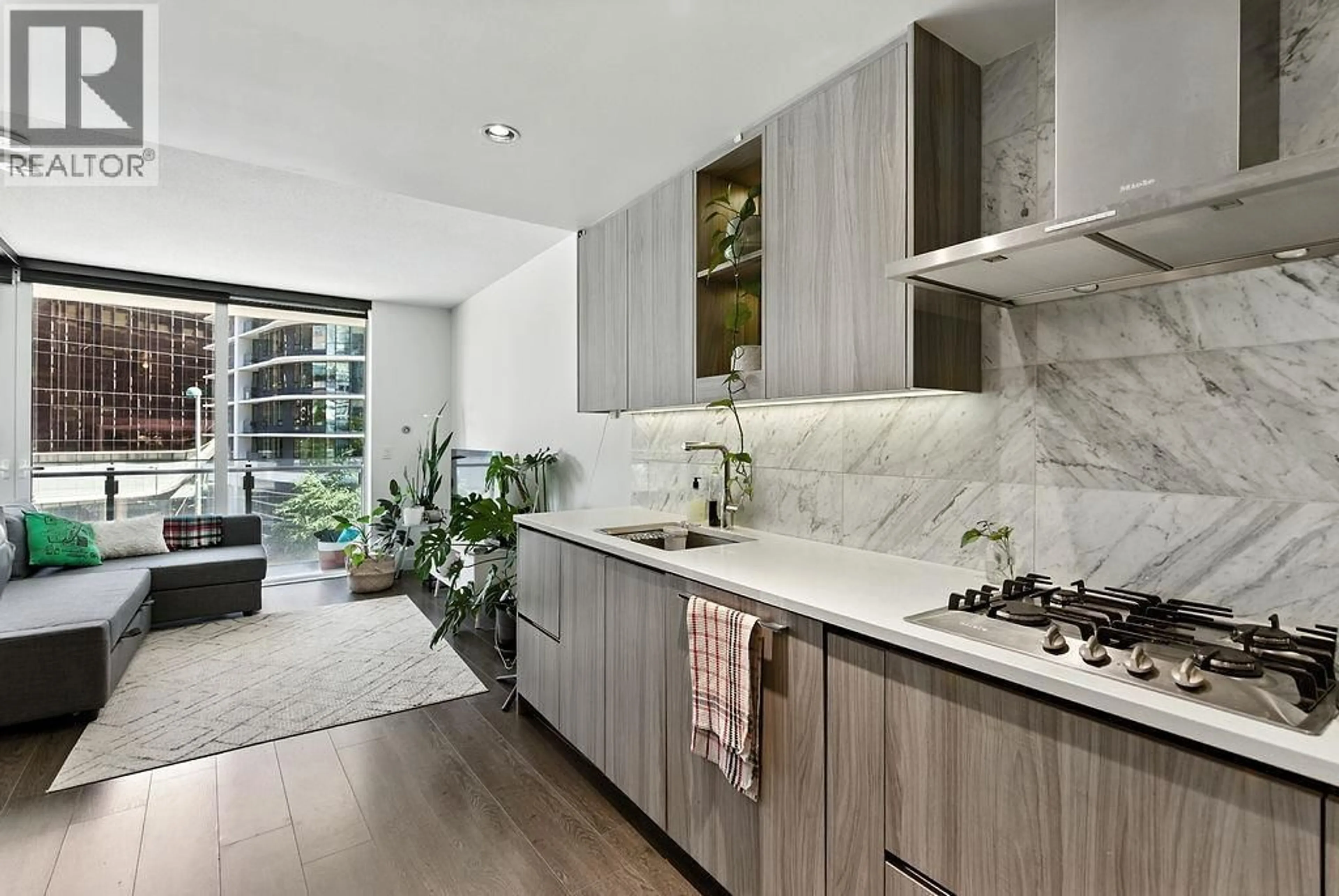 Contemporary kitchen, ceramic/tile floor for 408 - 89 NELSON STREET, Vancouver British Columbia V6Z0E7
