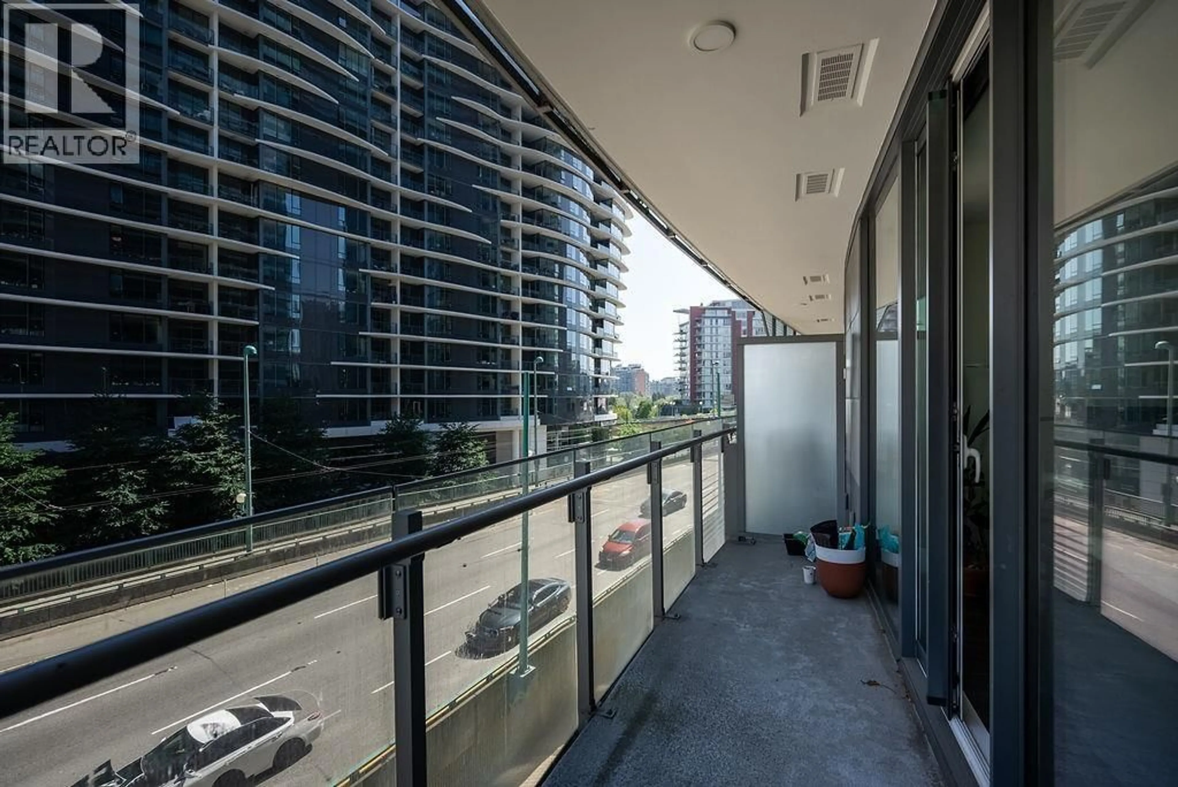 Balcony in the apartment, city buildings view from balcony for 408 - 89 NELSON STREET, Vancouver British Columbia V6Z0E7