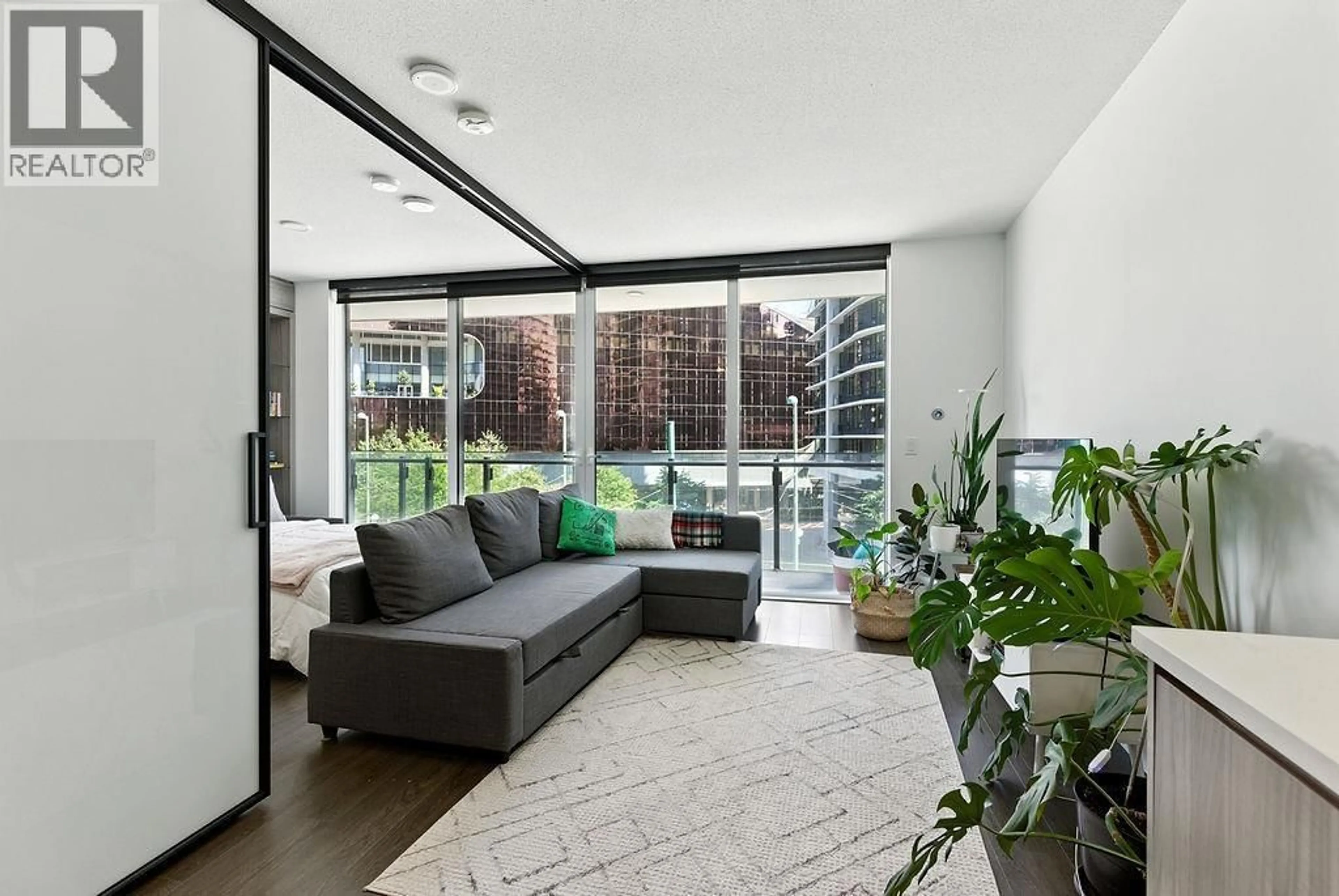 Living room with furniture, unknown for 408 - 89 NELSON STREET, Vancouver British Columbia V6Z0E7