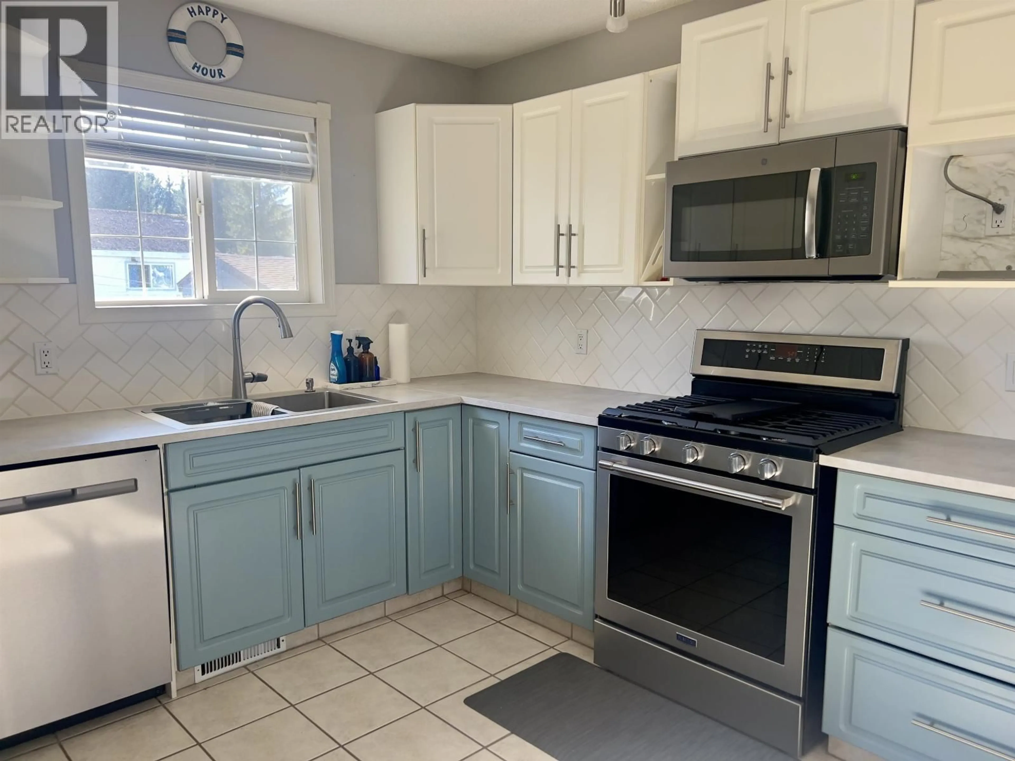 Standard kitchen, ceramic/tile floor for 44 OMENICA STREET, Kitimat British Columbia V8C1Z4