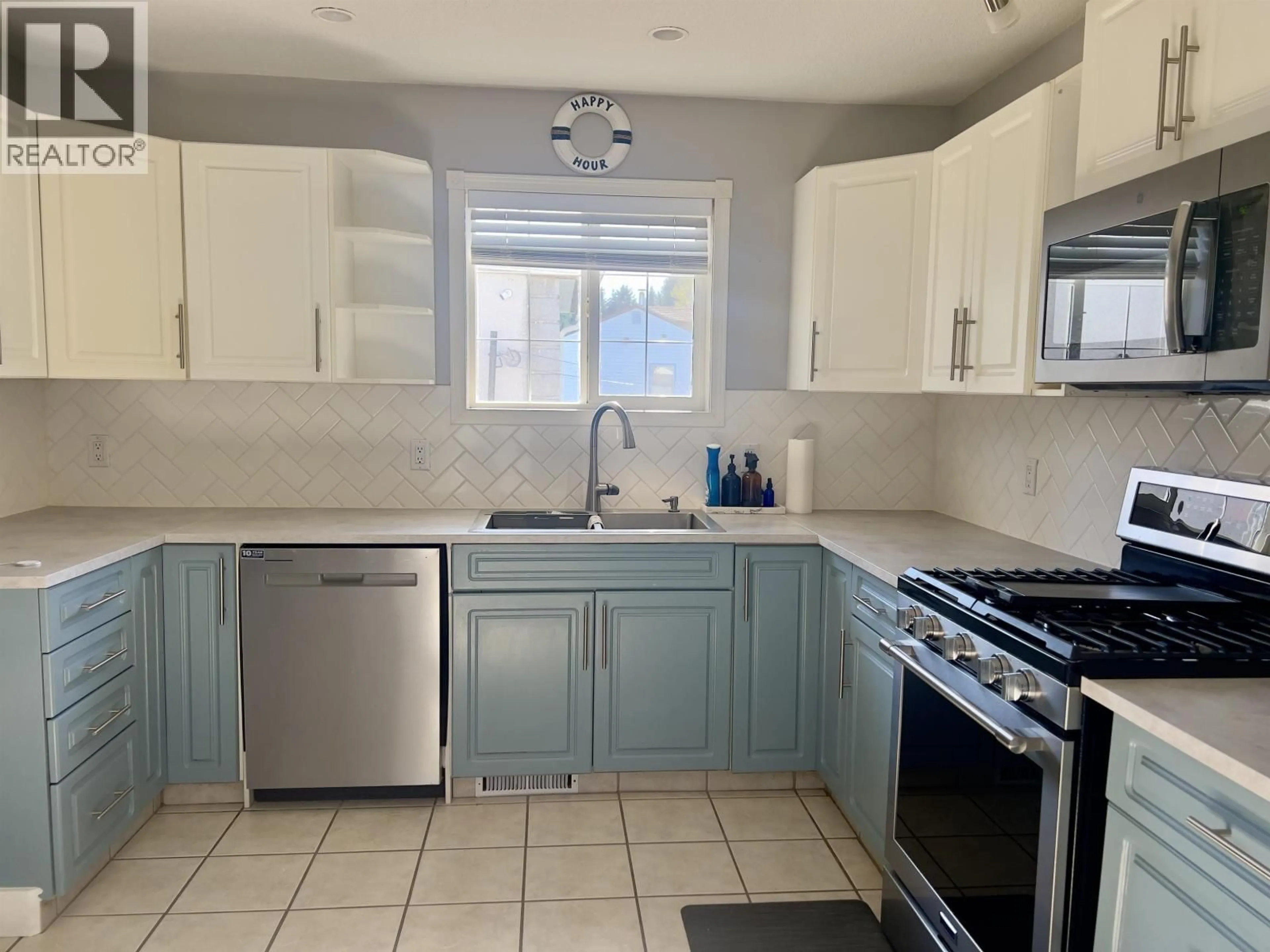 Standard kitchen, ceramic/tile floor for 44 OMENICA STREET, Kitimat British Columbia V8C1Z4