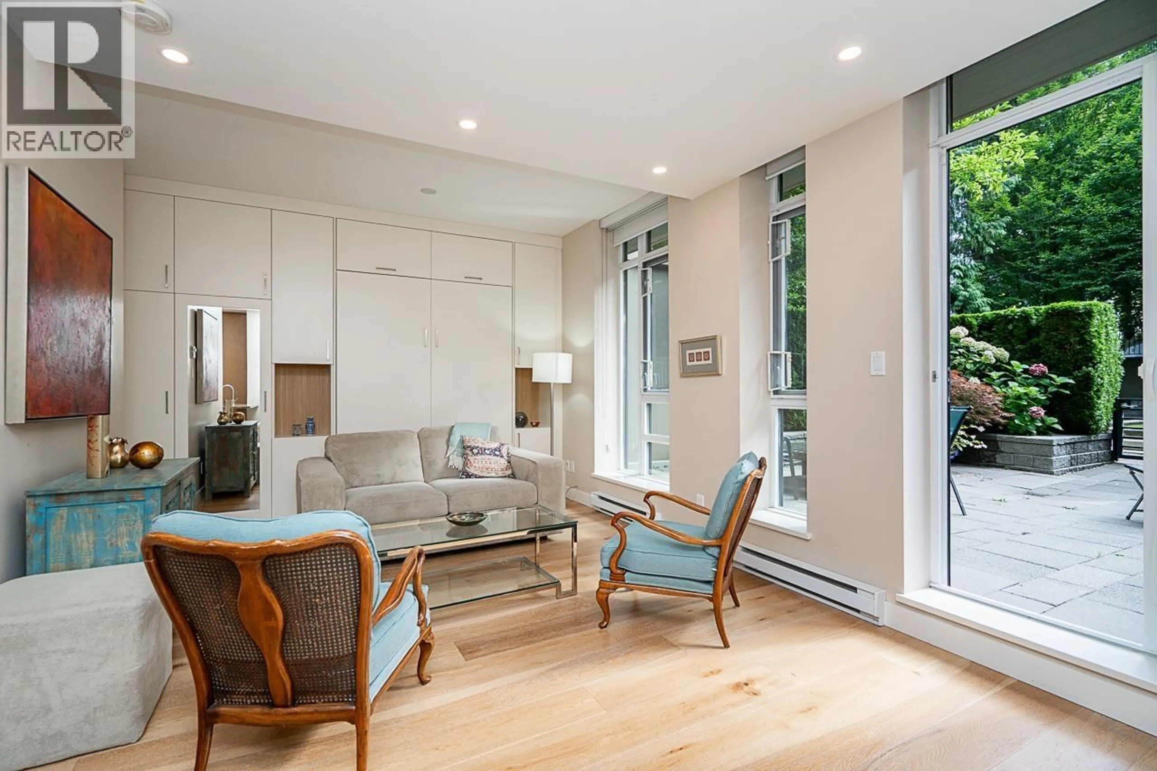 Living room with furniture, wood/laminate floor for 103 - 1468 14TH AVENUE, Vancouver British Columbia V6H0A2