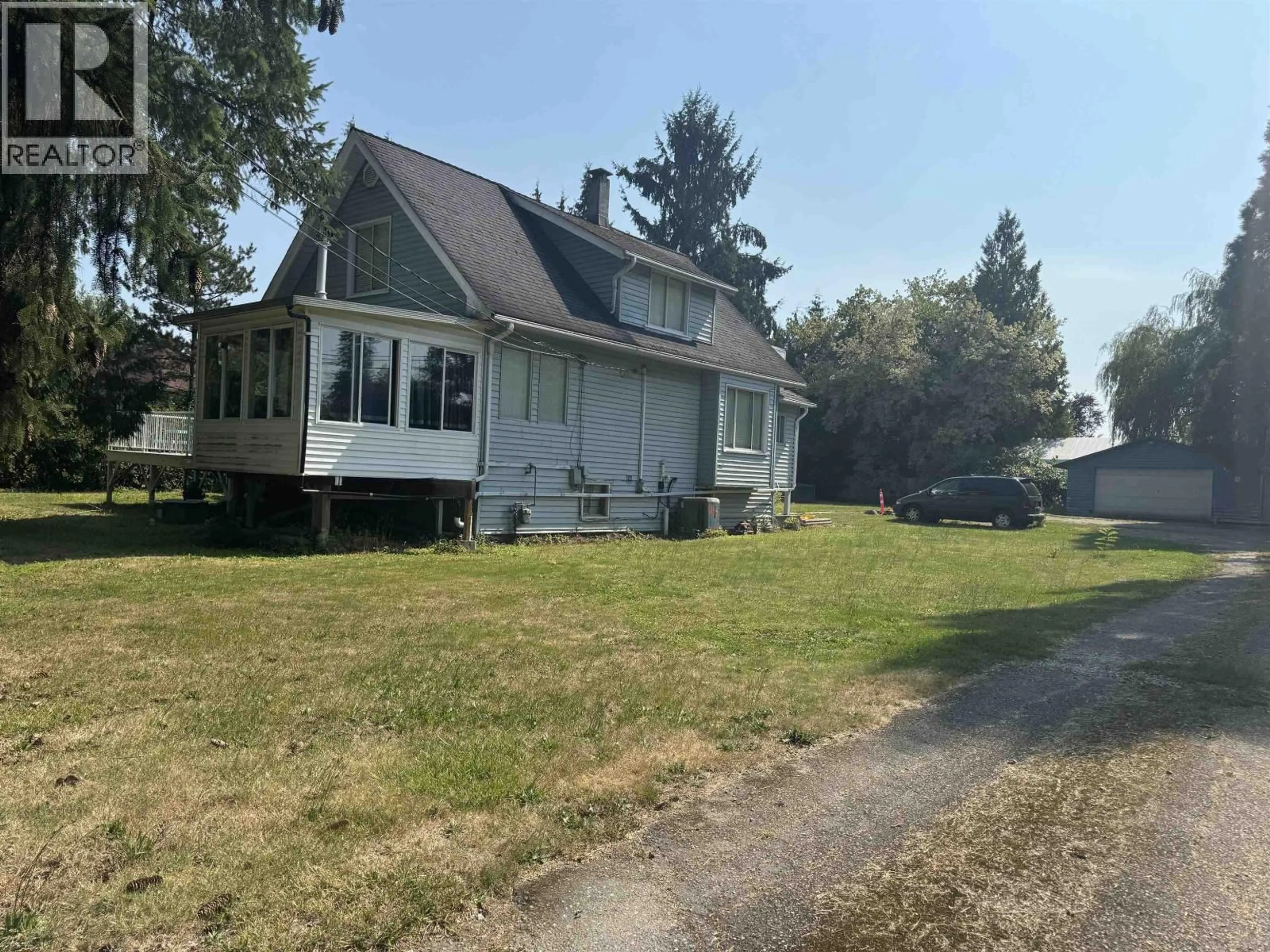 A pic from outside/outdoor area/front of a property/back of a property/a pic from drone, street for 22034 124TH AVENUE, Maple Ridge British Columbia V2X4J2