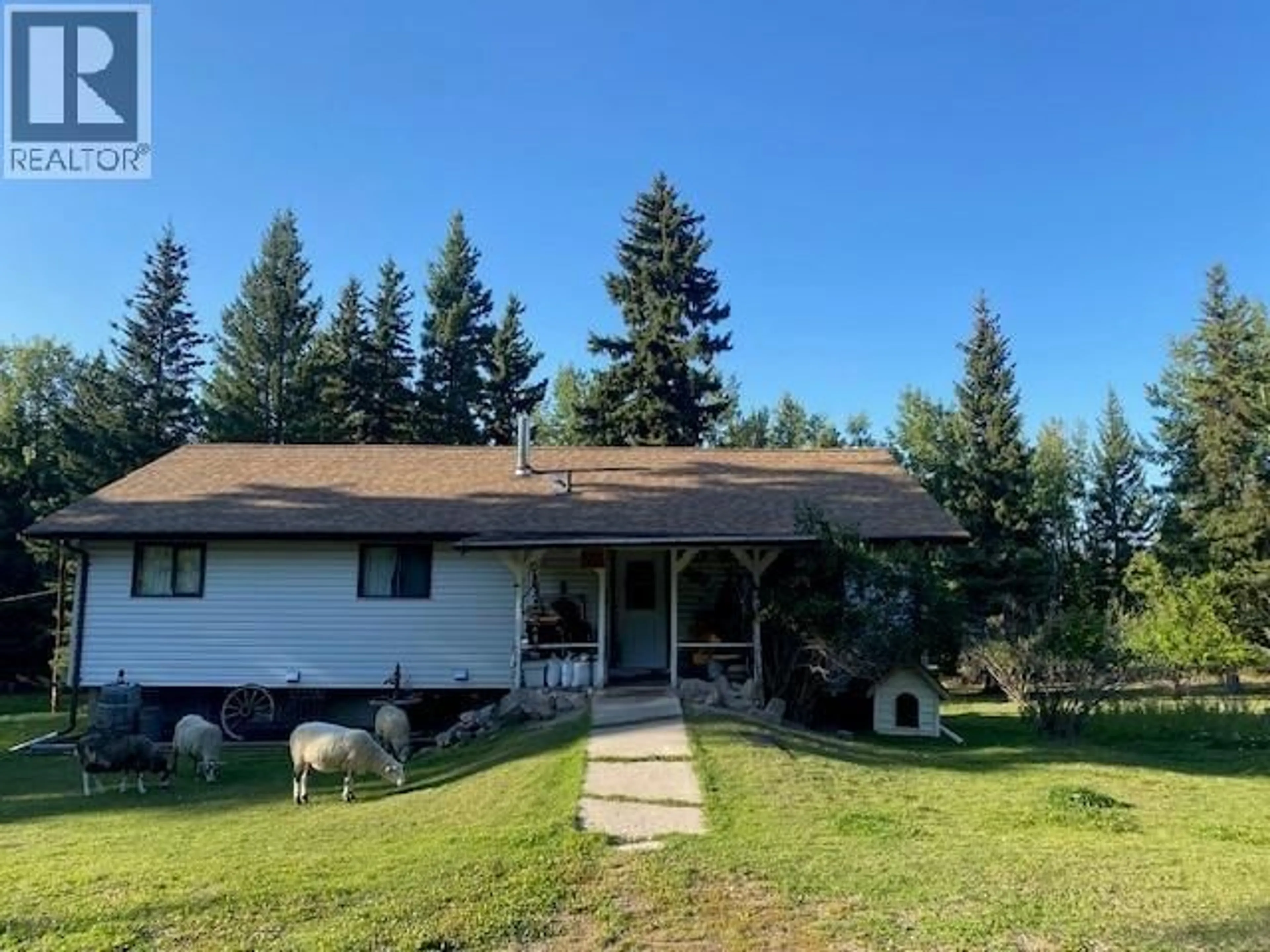 A pic from outside/outdoor area/front of a property/back of a property/a pic from drone, mountain view for 323 OAK ROAD, Vanderhoof British Columbia V0J3A2