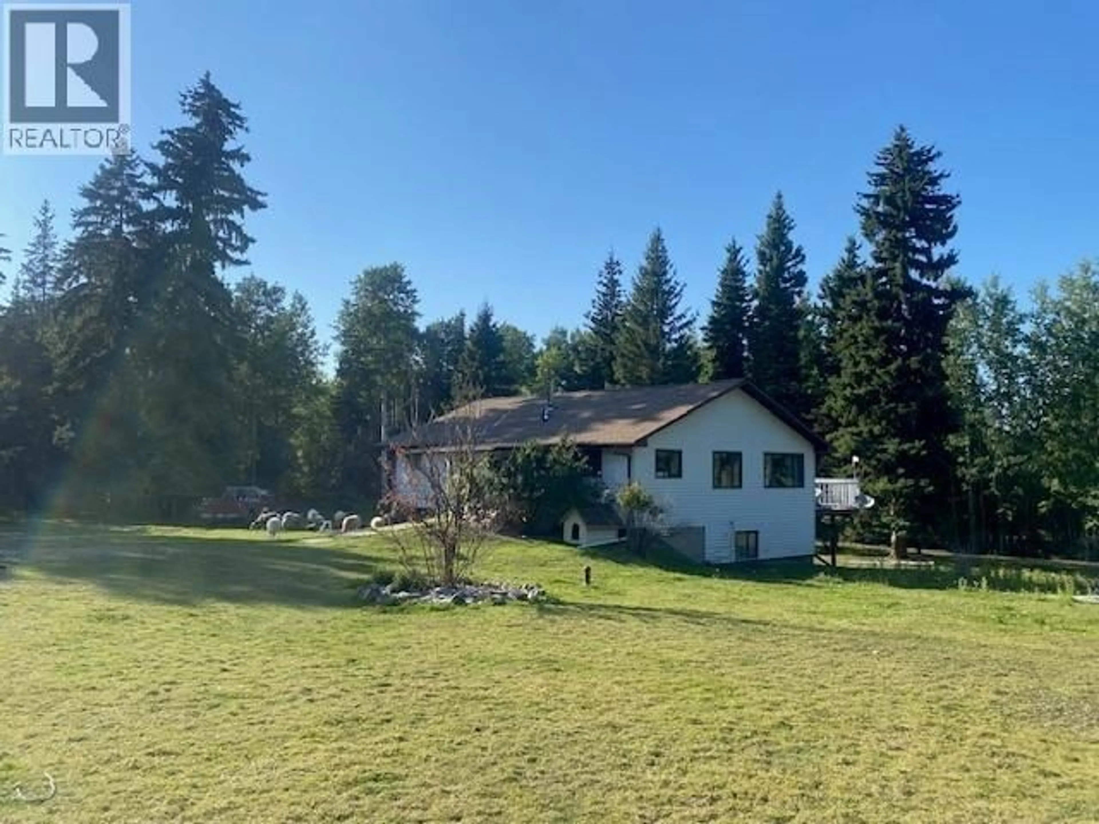 A pic from outside/outdoor area/front of a property/back of a property/a pic from drone, forest/trees view for 323 OAK ROAD, Vanderhoof British Columbia V0J3A2
