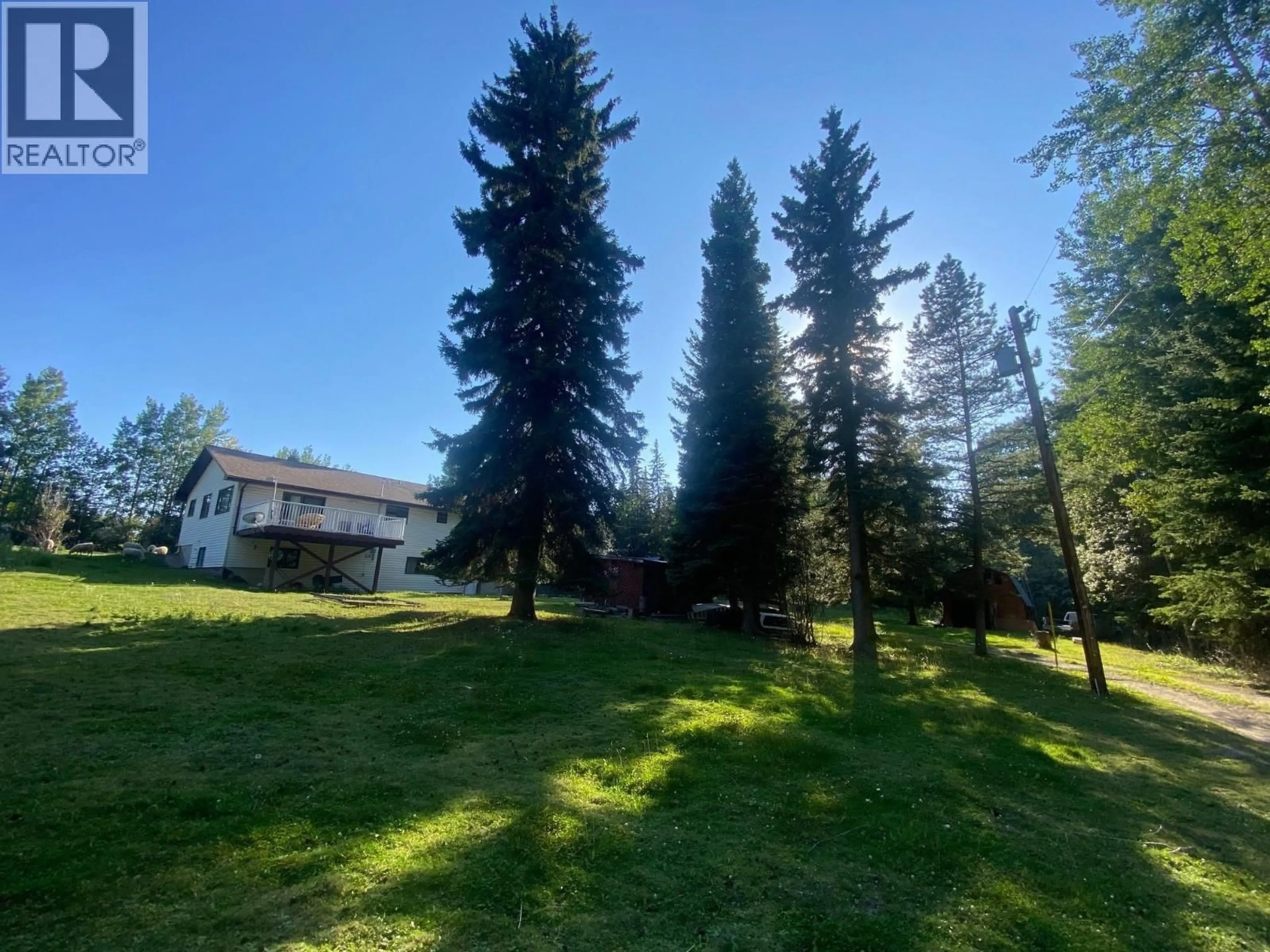 A pic from outside/outdoor area/front of a property/back of a property/a pic from drone, forest/trees view for 323 OAK ROAD, Vanderhoof British Columbia V0J3A2