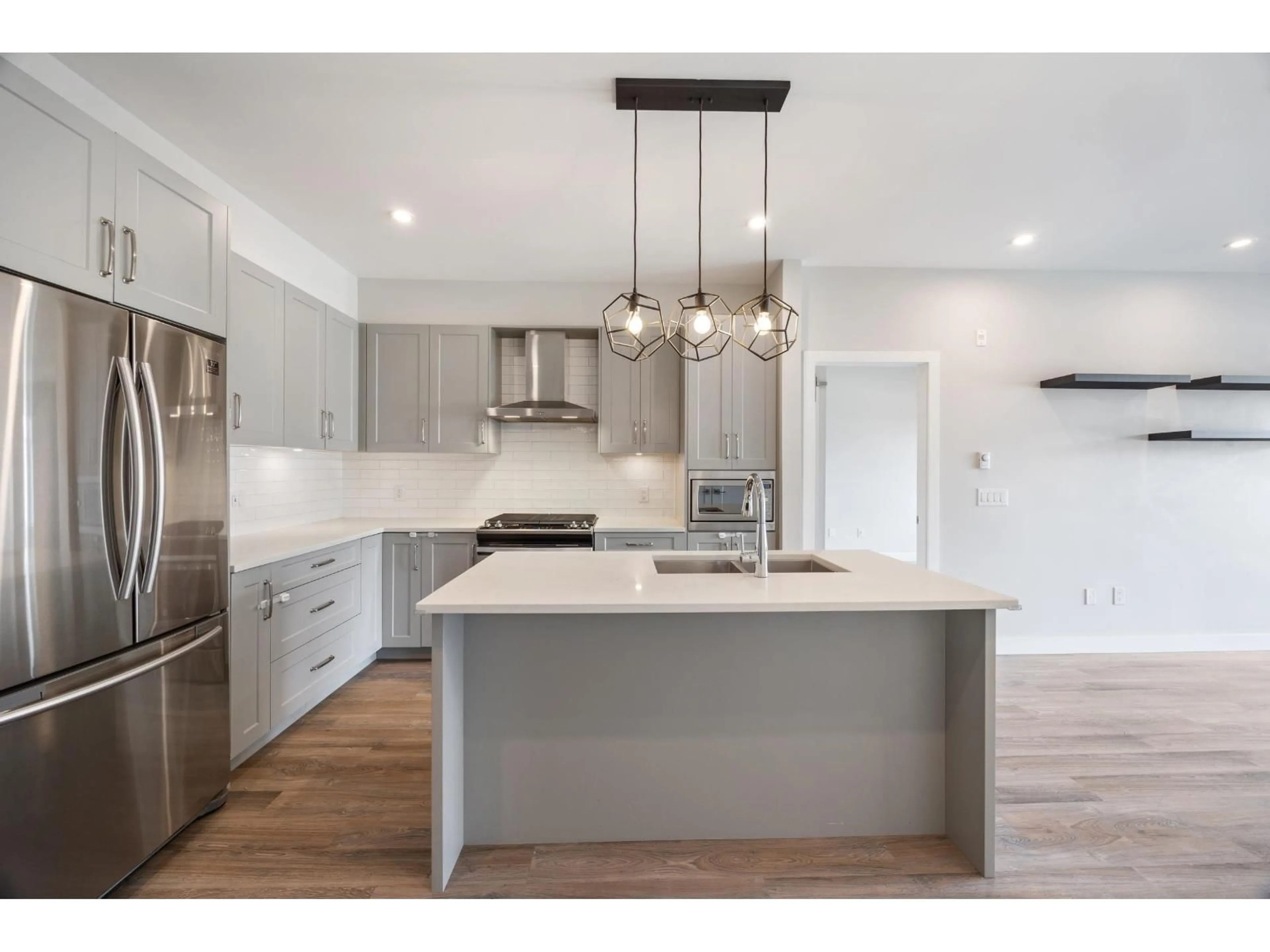Open concept kitchen, unknown for 412 - 15436 31, Surrey British Columbia V3Z1H3