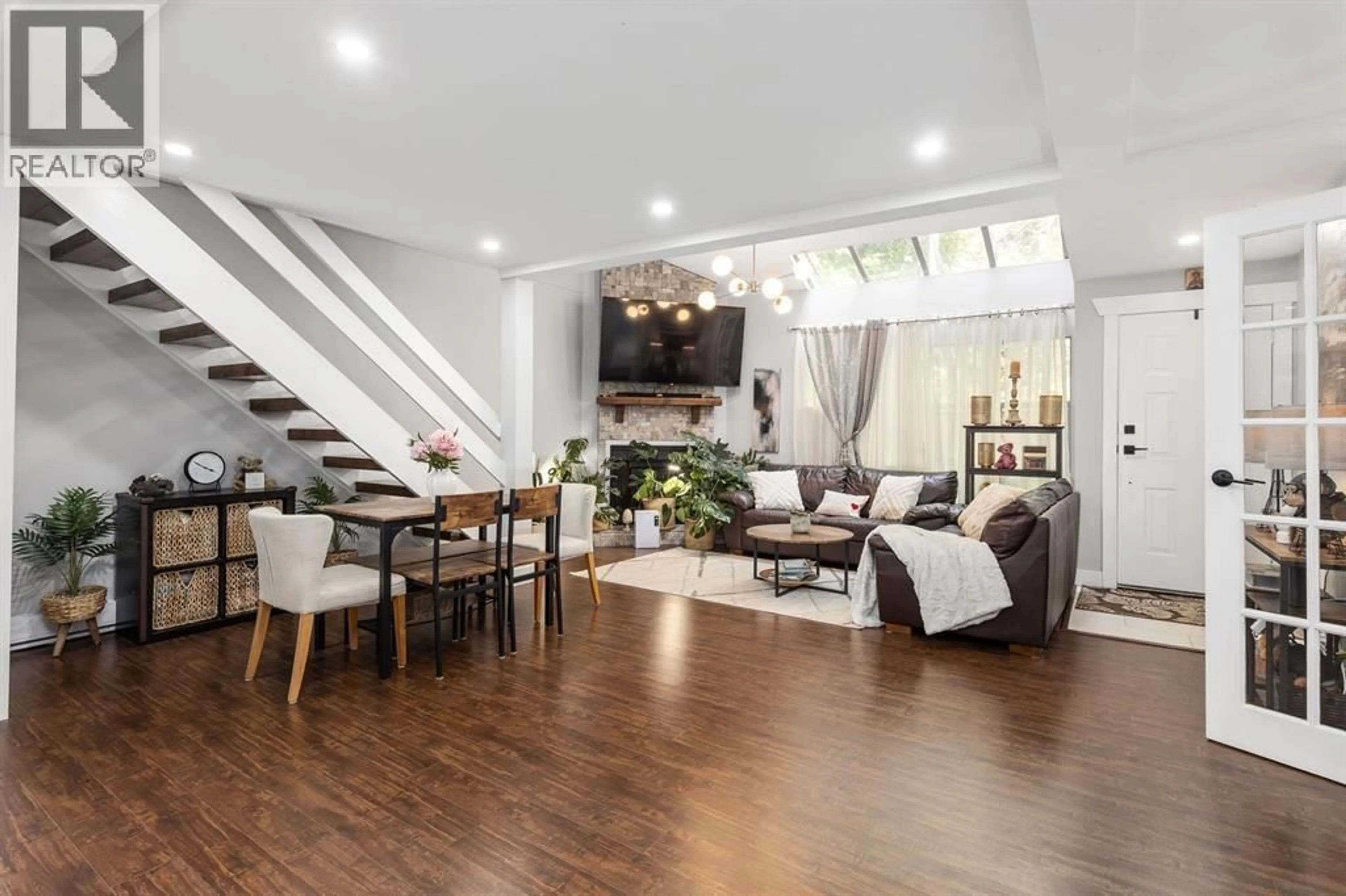 Living room with furniture, wood/laminate floor for 15 - 7540 ABERCROMBIE DRIVE, Richmond British Columbia V6Y3J8