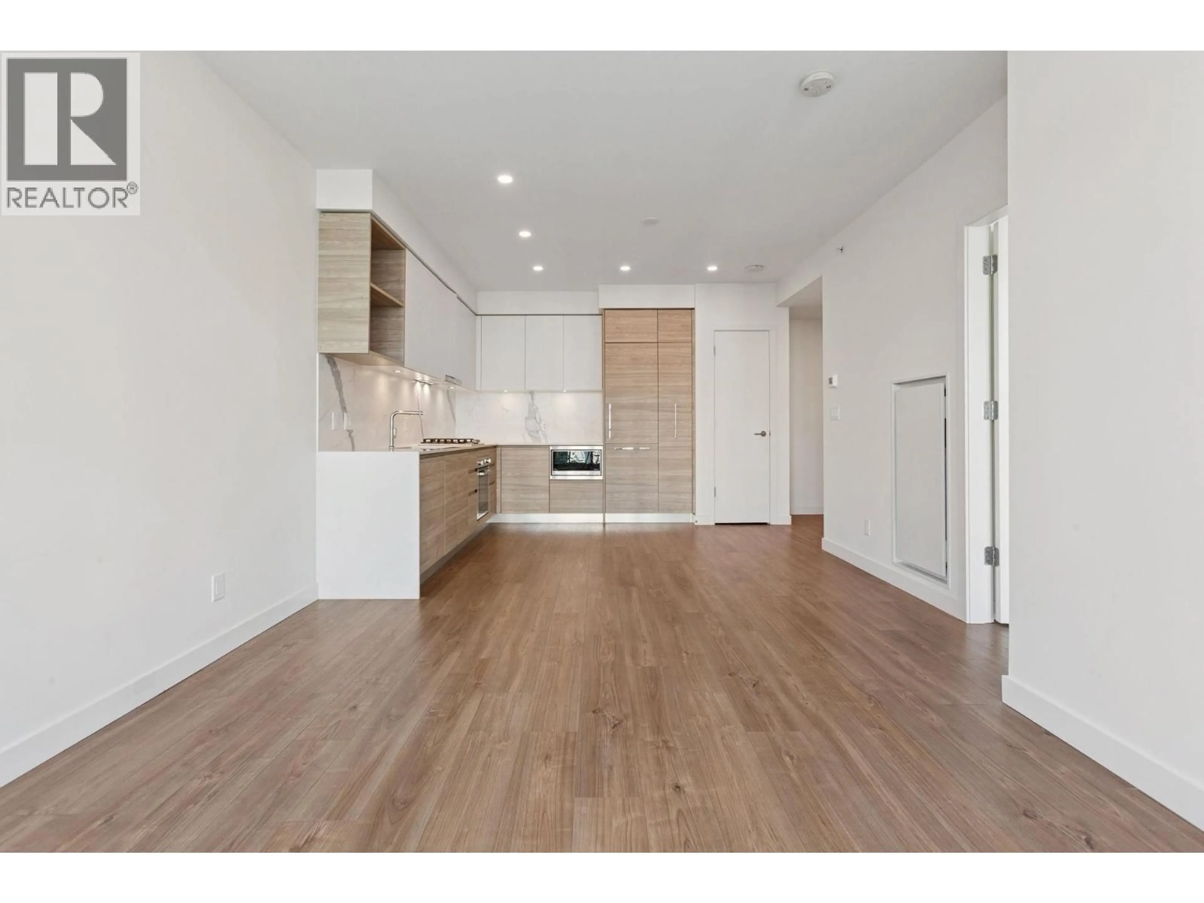 Open concept kitchen, wood/laminate floor for 708 - 585 AUSTIN AVENUE, Coquitlam British Columbia V3K0G6