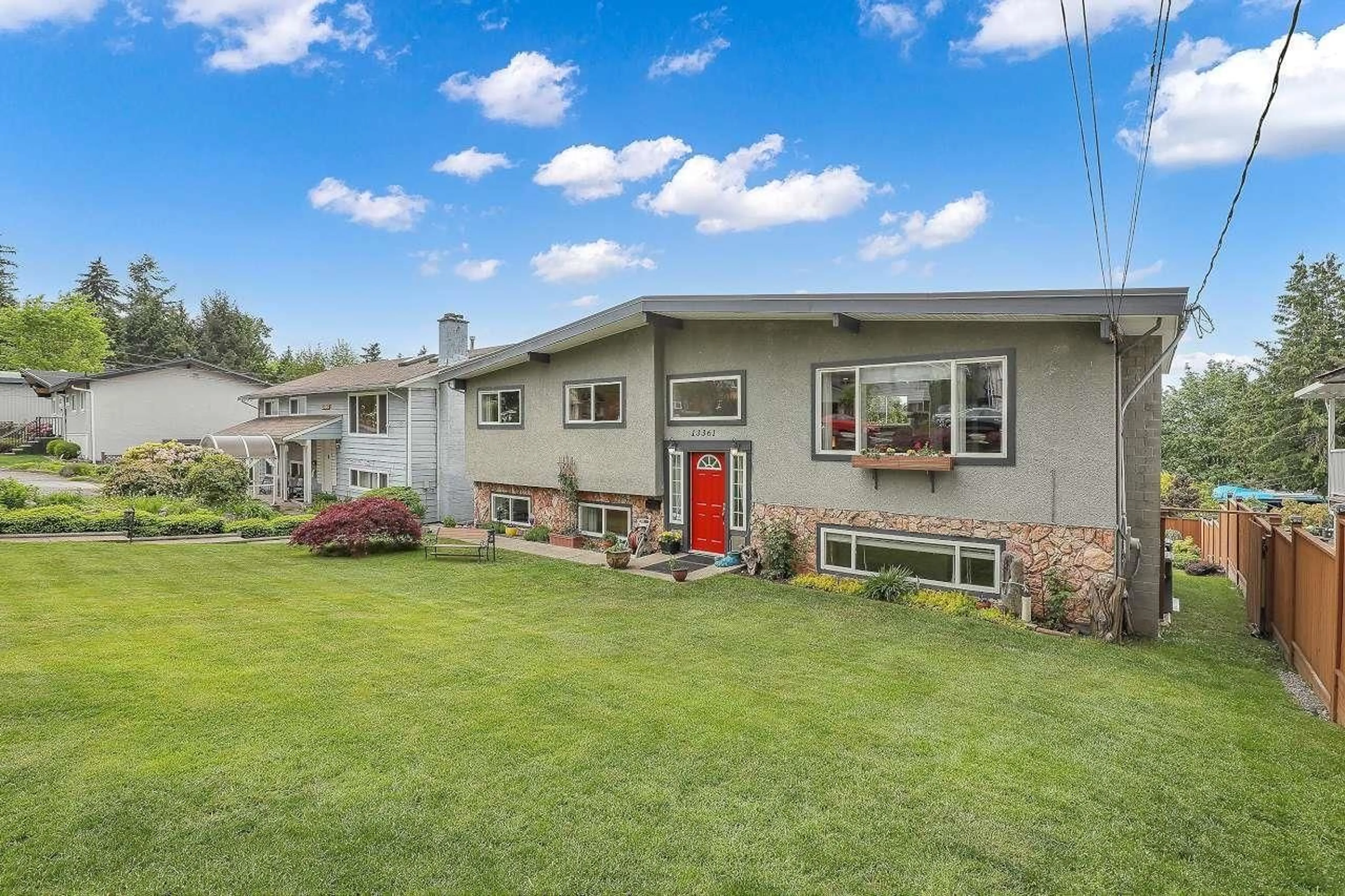Home with vinyl exterior material, street for 13361 112A, Surrey British Columbia V3R2G6
