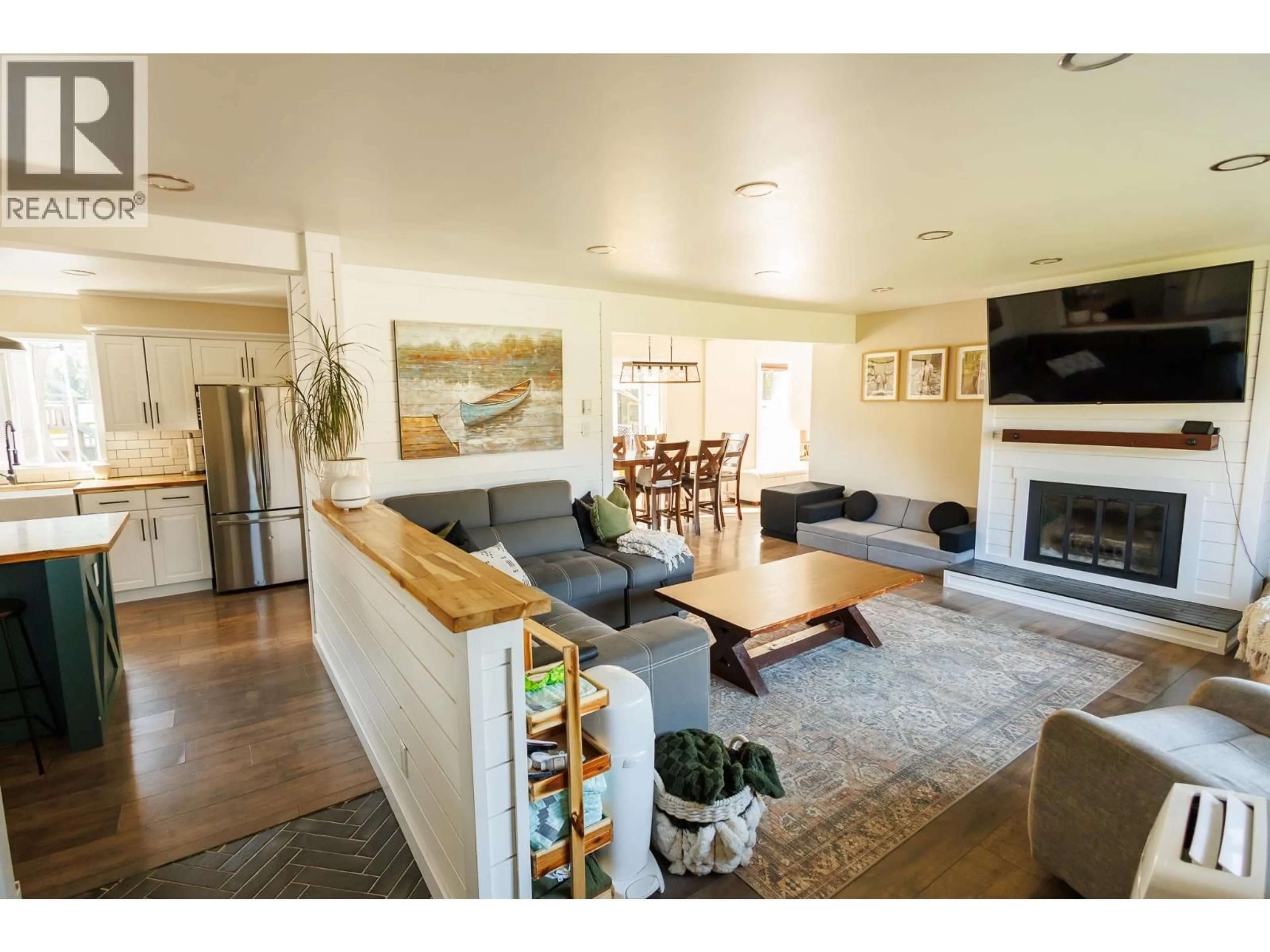 Living room with furniture, wood/laminate floor for 4619 BEAVER CRESCENT, Terrace British Columbia V8G0A5