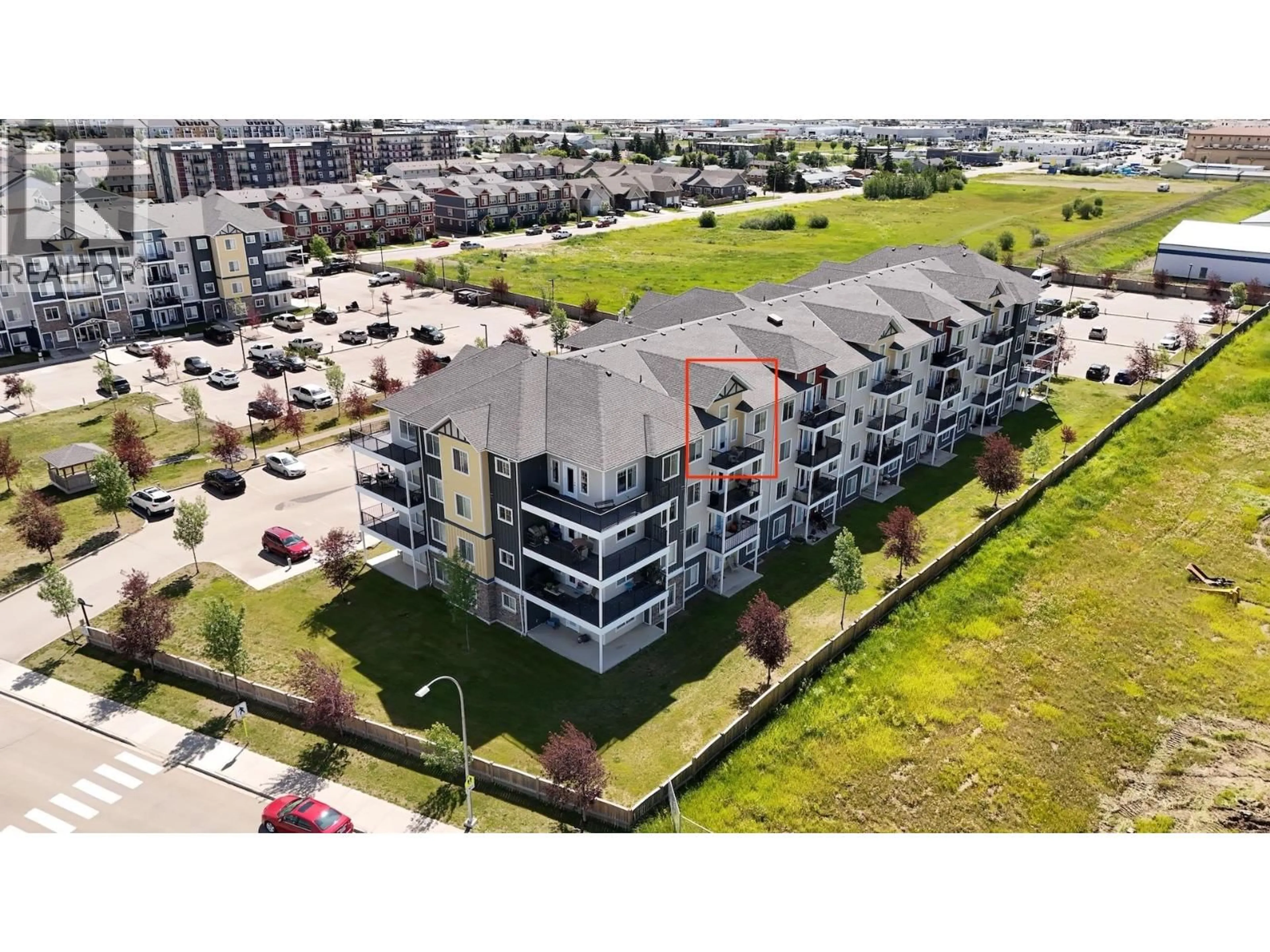 A pic from outside/outdoor area/front of a property/back of a property/a pic from drone, city buildings view from balcony for 409 - 11205 105 AVENUE, Fort St. John British Columbia V1J0L3