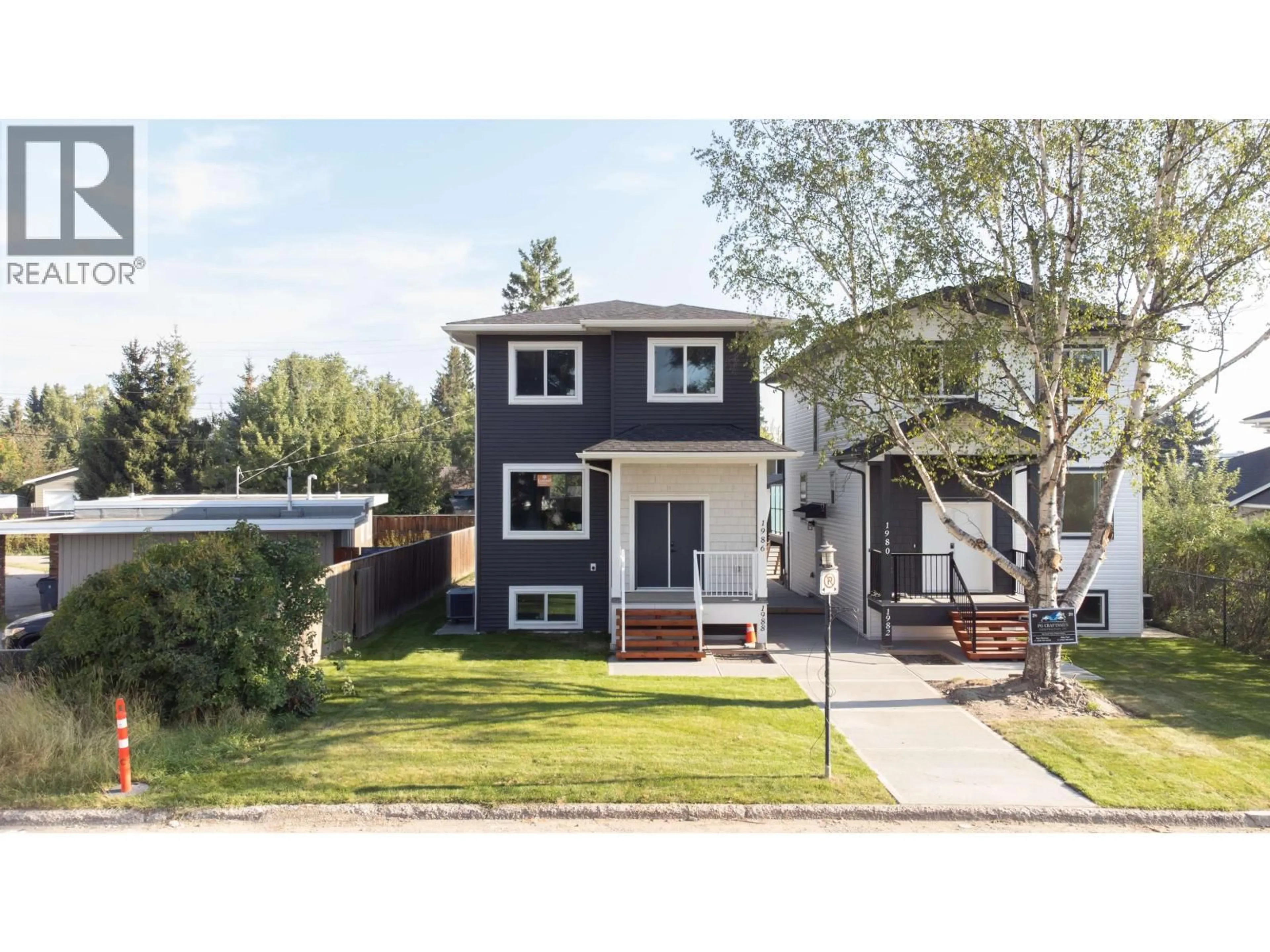 Home with vinyl exterior material, street for 1980 12TH AVENUE, Prince George British Columbia V2M1R9