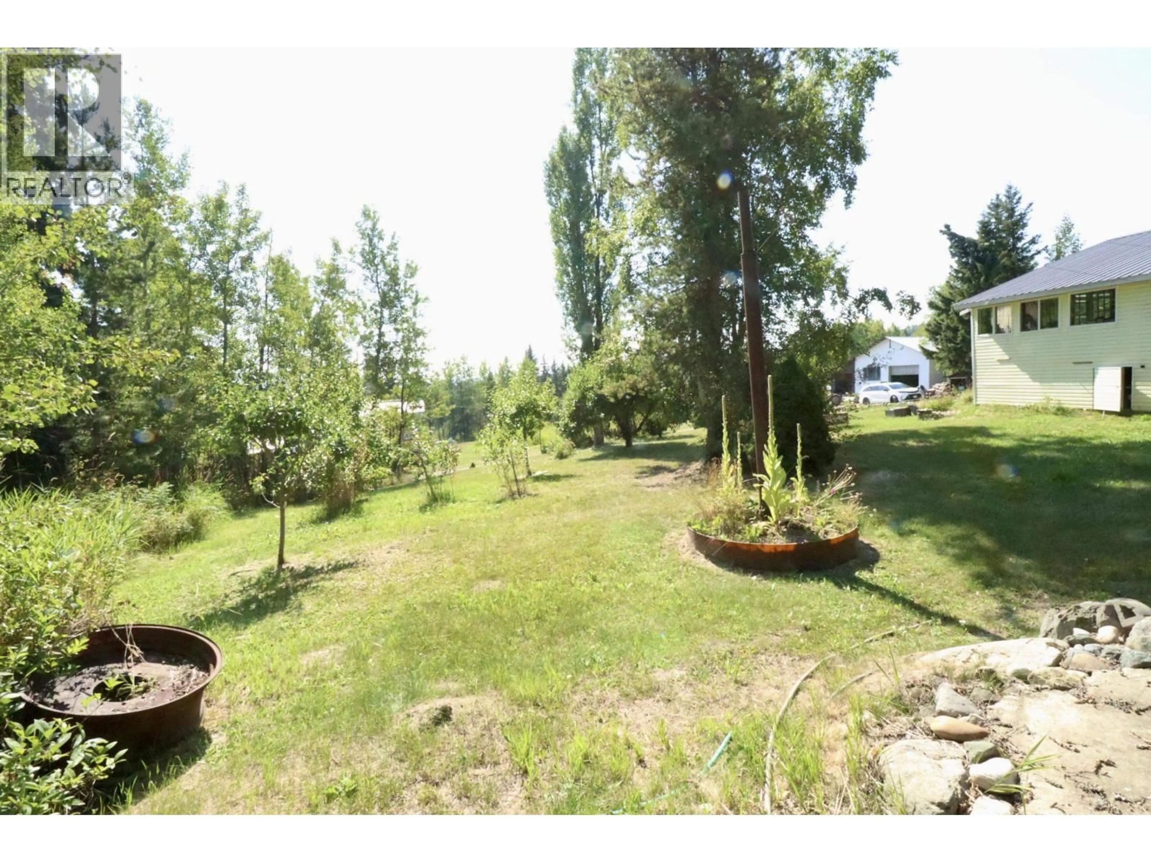 A pic from outside/outdoor area/front of a property/back of a property/a pic from drone, forest/trees view for 38223 BANNOCK ROAD, Hixon British Columbia V0K1S1