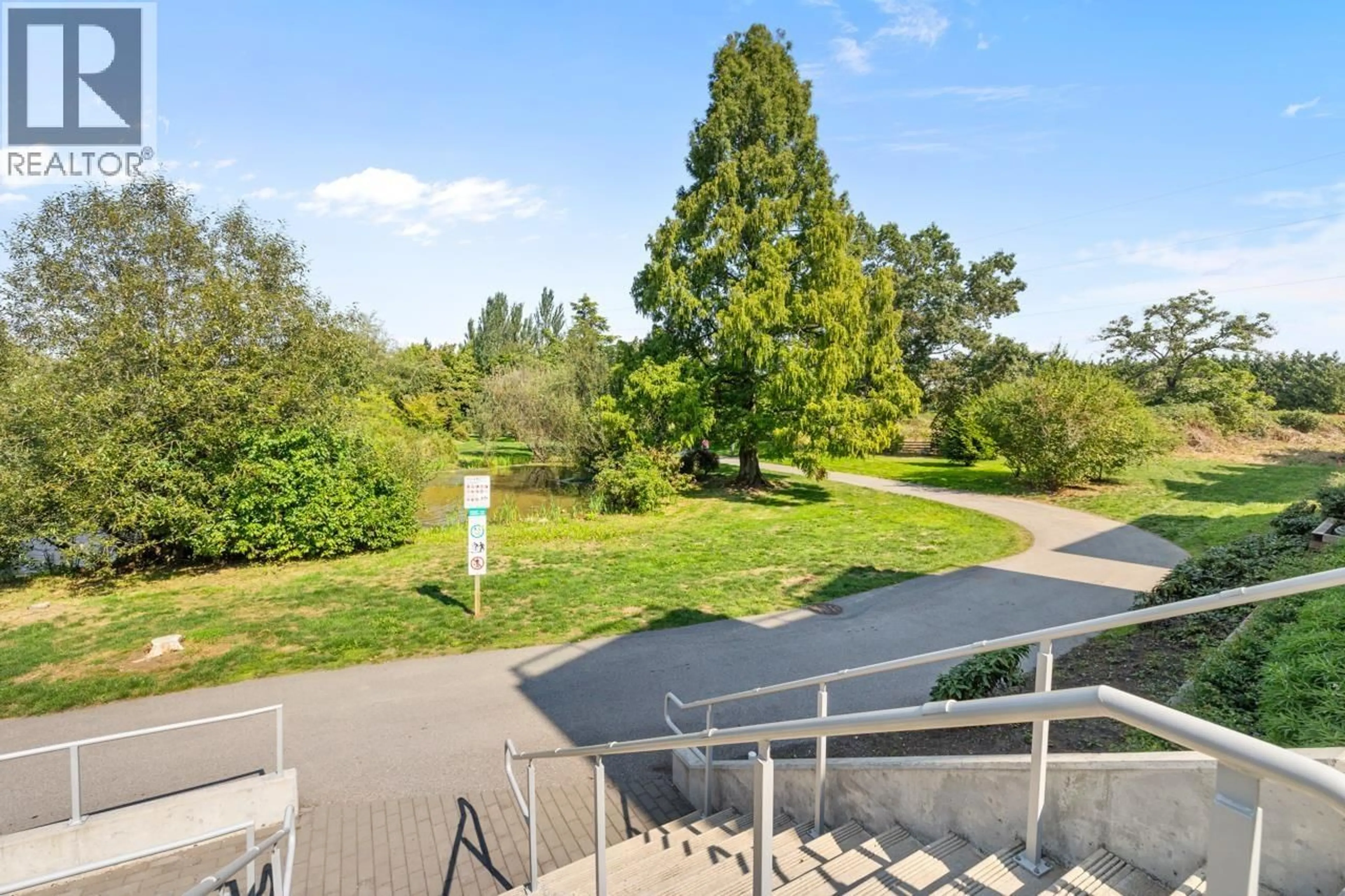 A pic from outside/outdoor area/front of a property/back of a property/a pic from drone, unknown for 8 - 10800 NO. 5 ROAD, Richmond British Columbia V6W0C2