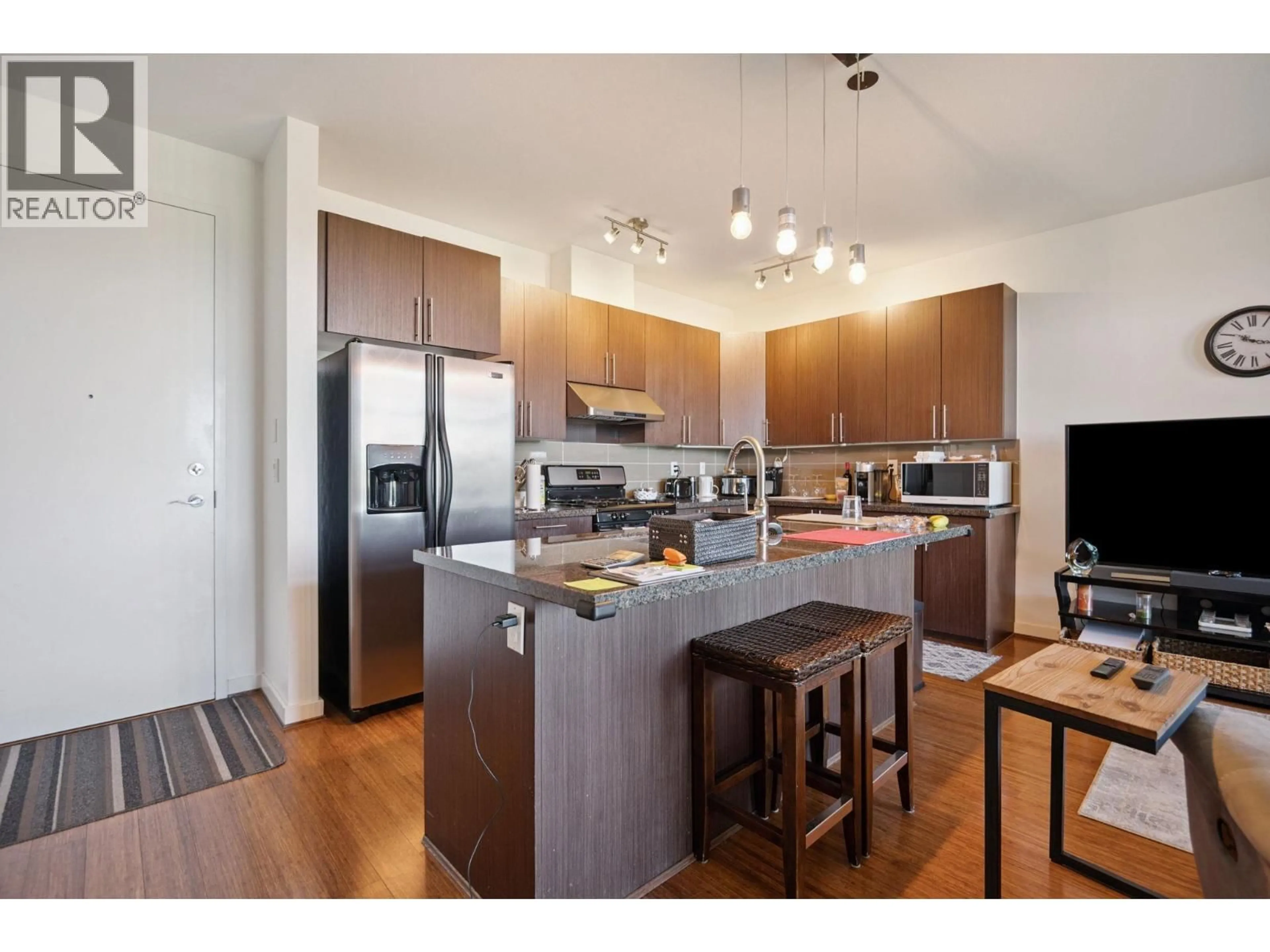 Open concept kitchen, wood/laminate floor for 206 - 6233 LONDON ROAD, Richmond British Columbia V7E3S3