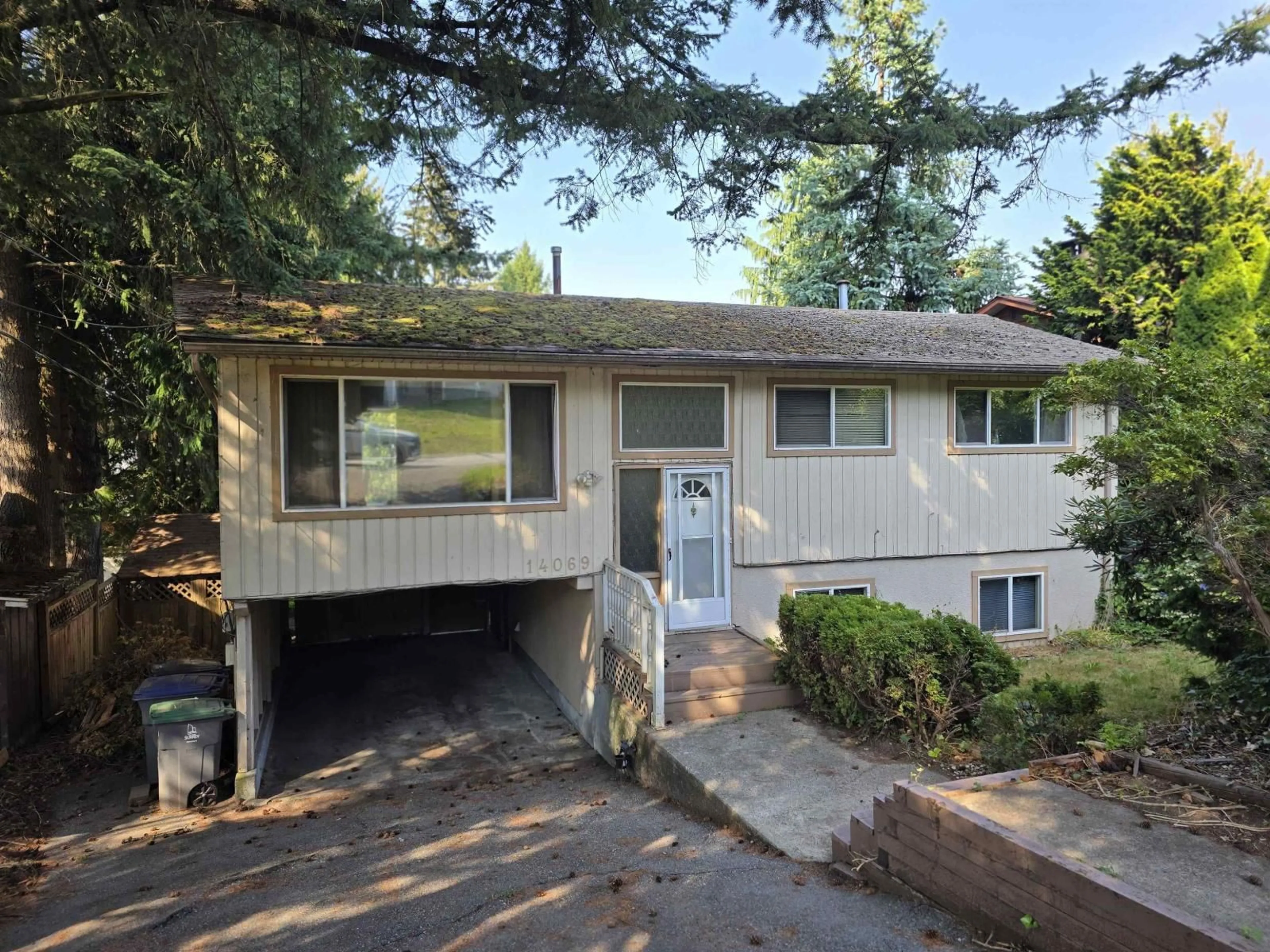 Home with vinyl exterior material, street for 14069 115A, Surrey British Columbia V3R2R6