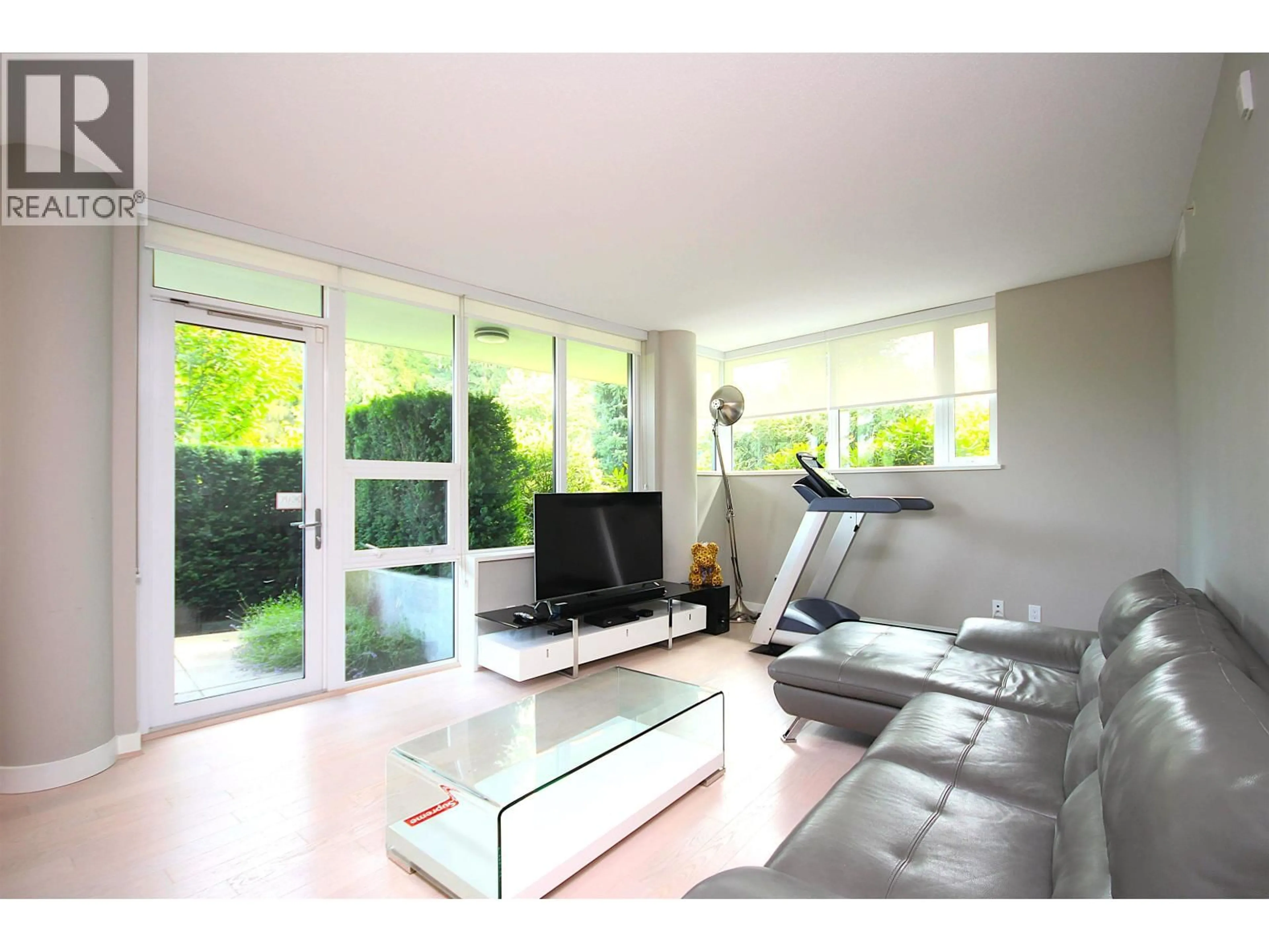 Living room with furniture, wood/laminate floor for 106 - 508 29TH AVENUE, Vancouver British Columbia V5Z2H7