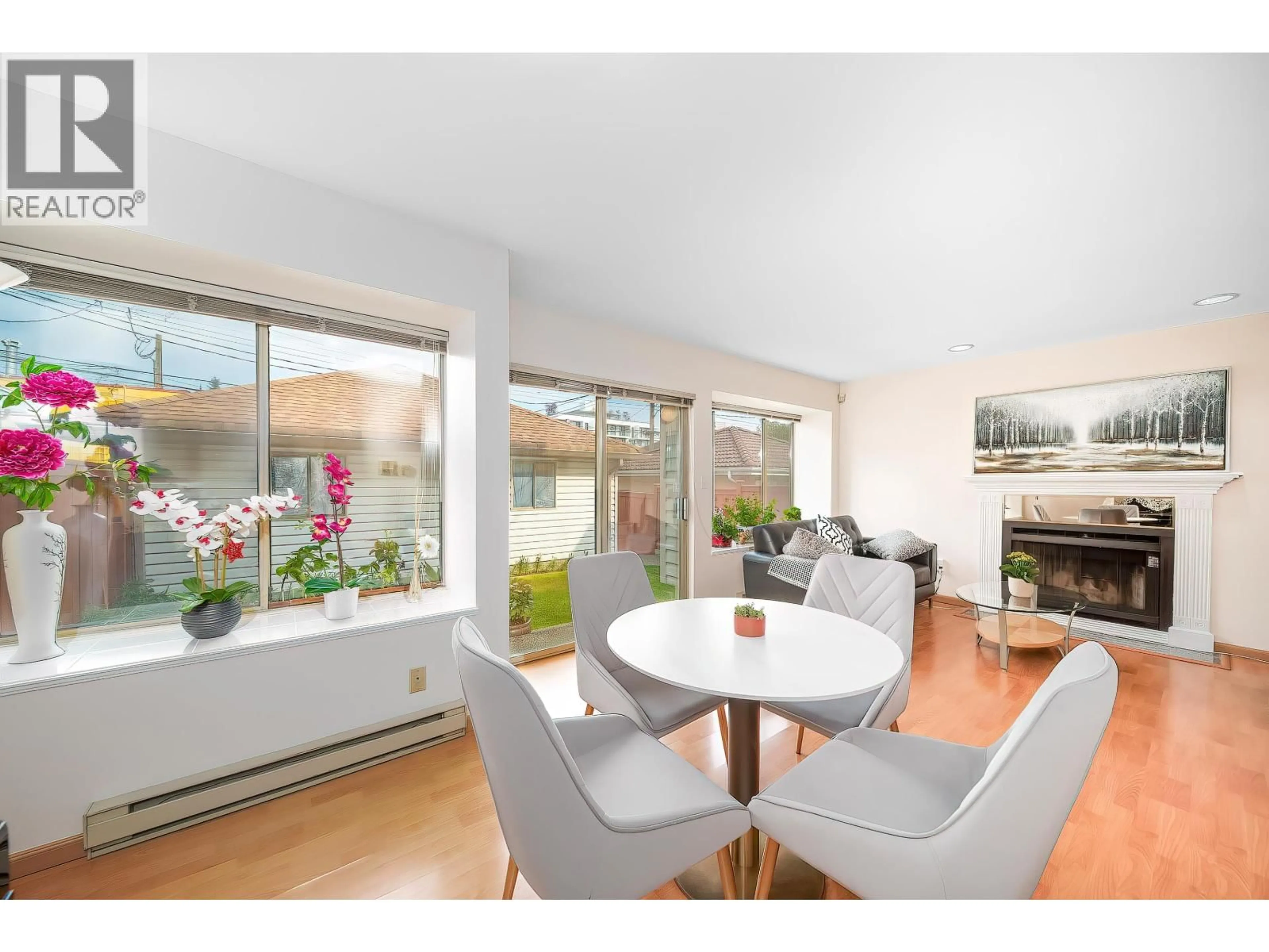 Living room with furniture, wood/laminate floor for 8328 OSLER STREET, Vancouver British Columbia V6P4E4