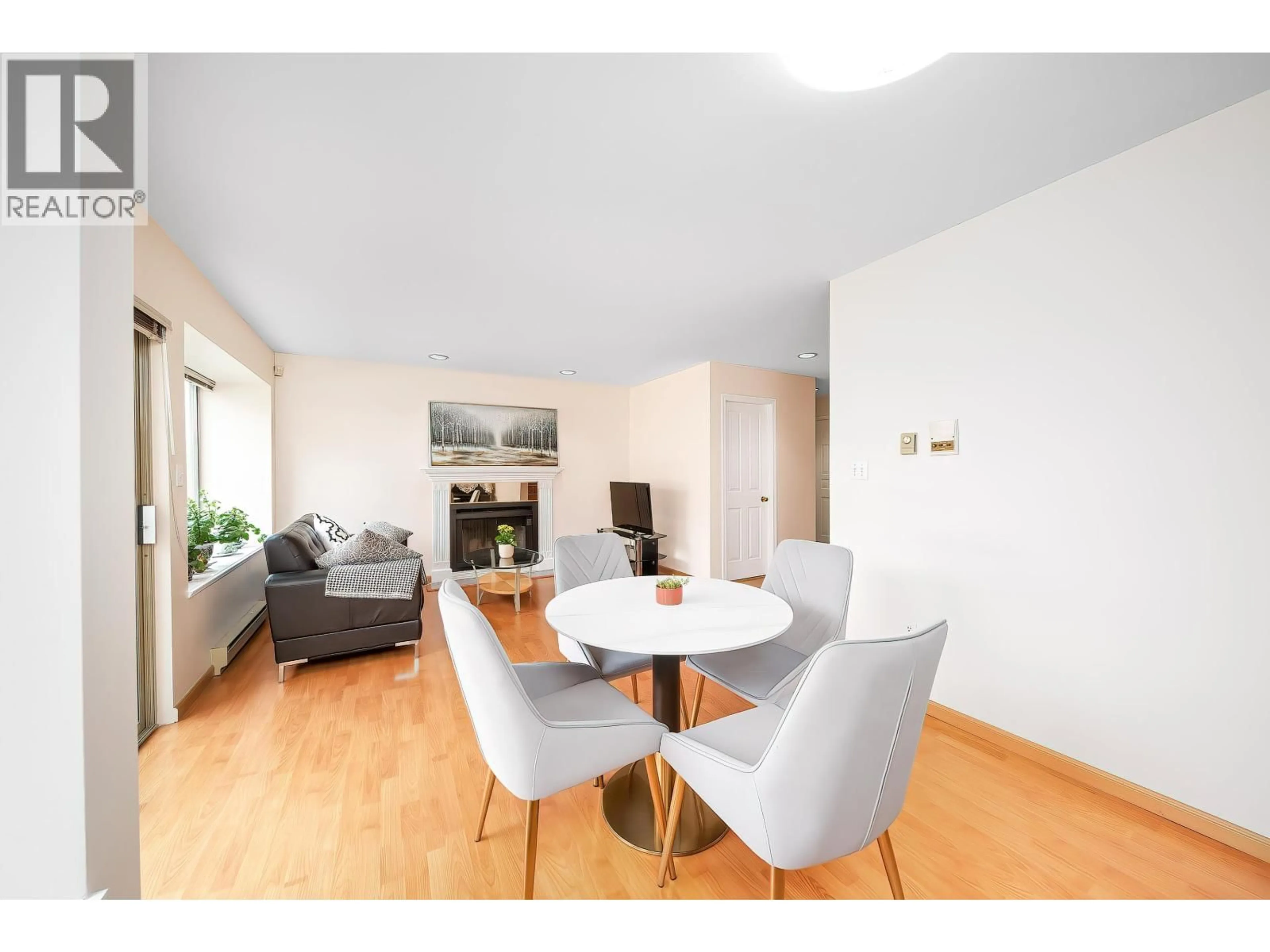 Living room with furniture, wood/laminate floor for 8328 OSLER STREET, Vancouver British Columbia V6P4E4